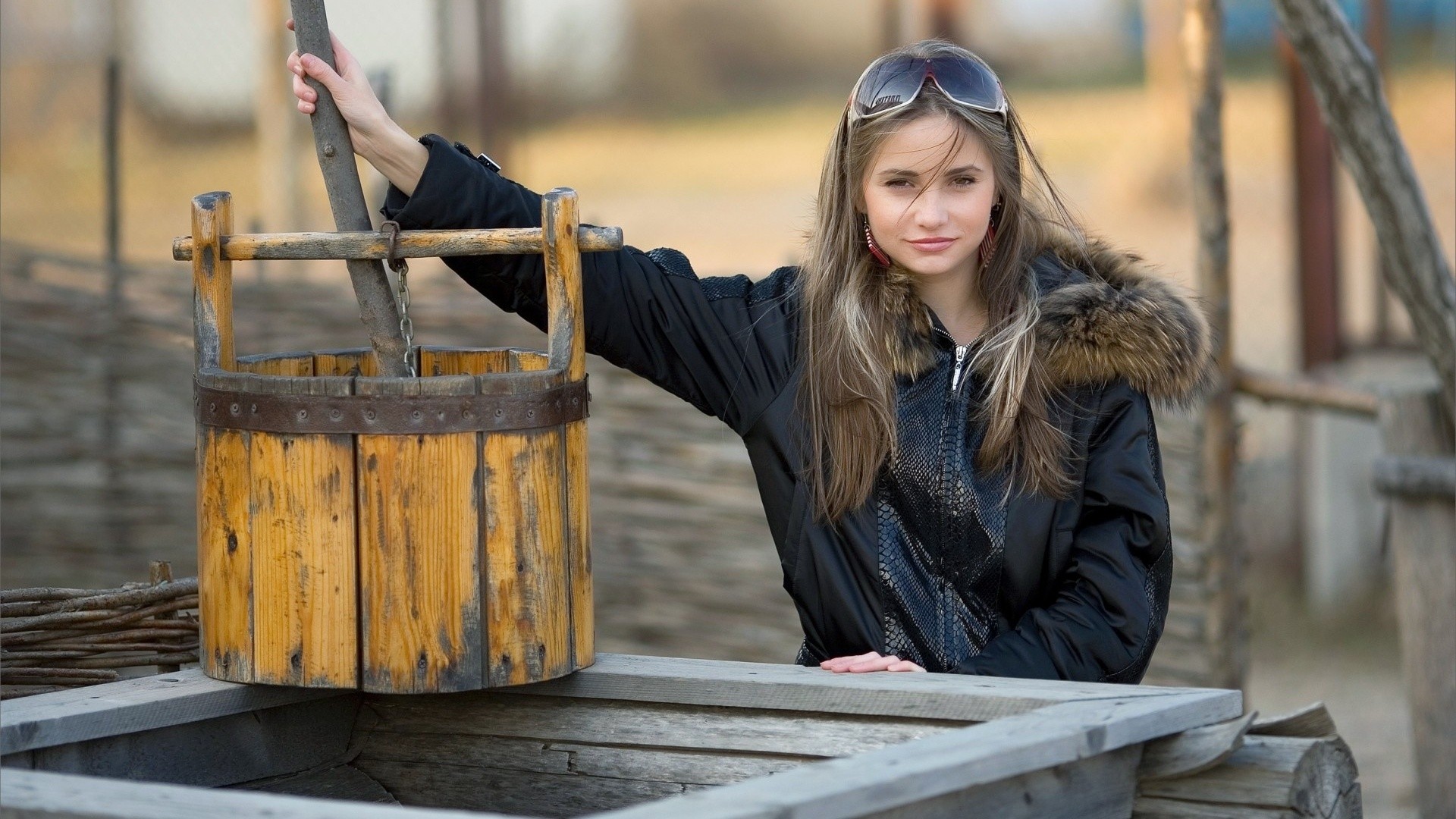 Women Model Brunette Long Hair Looking At Viewer Women Outdoors Sunglasses Fur Bucket Wood Black Jac 1920x1080