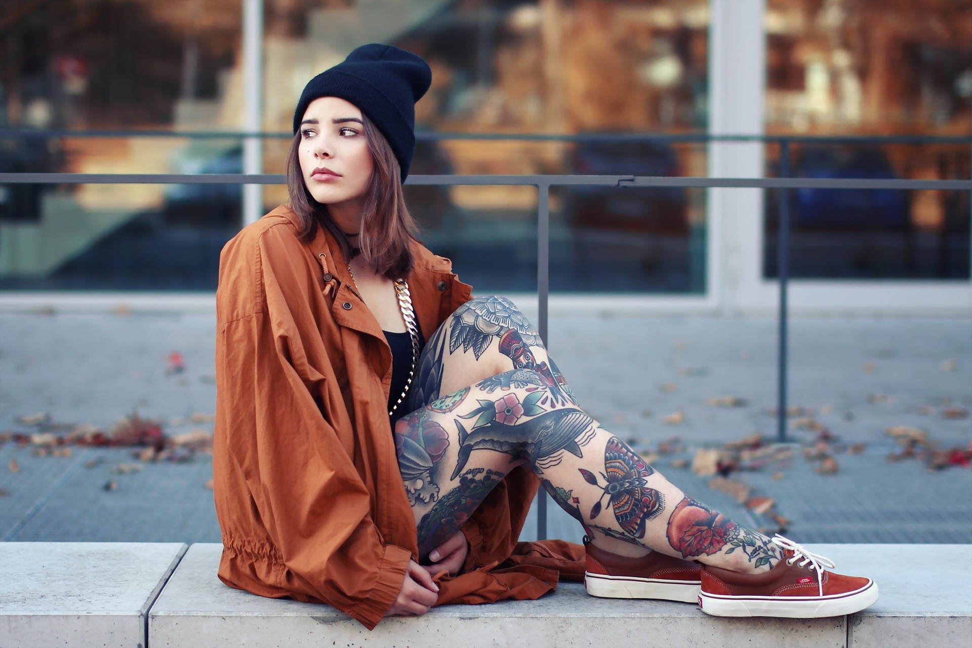 Women Sitting Tattoo Sneakers Model Orange Jacket Legs Looking Away Brunette 1920x1280