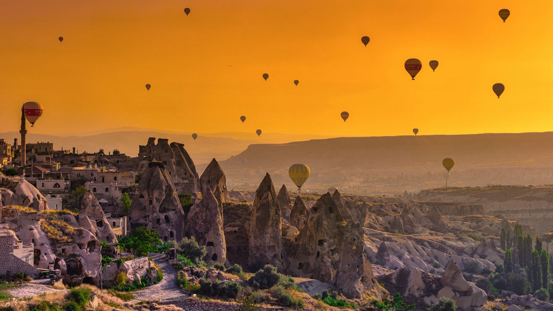 Hot Air Balloons Cappadocia Ancient Village Landscape Orange Sky 1920x1080