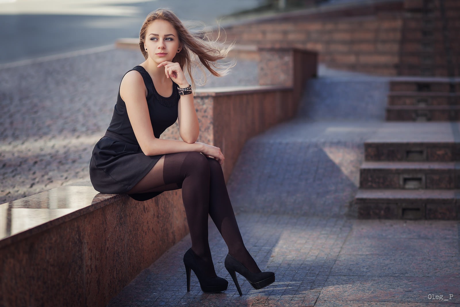 Women Blonde Sitting Black Dress Black Heels High Heels Looking Away 1600x1067