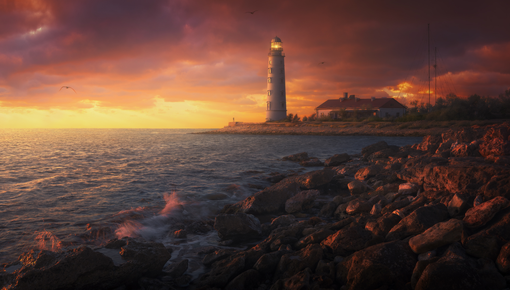 Ilya Melikhov Landscape Lighthouse Sky Red Sky Shore Rocks Water Horizon Birds 1700x969