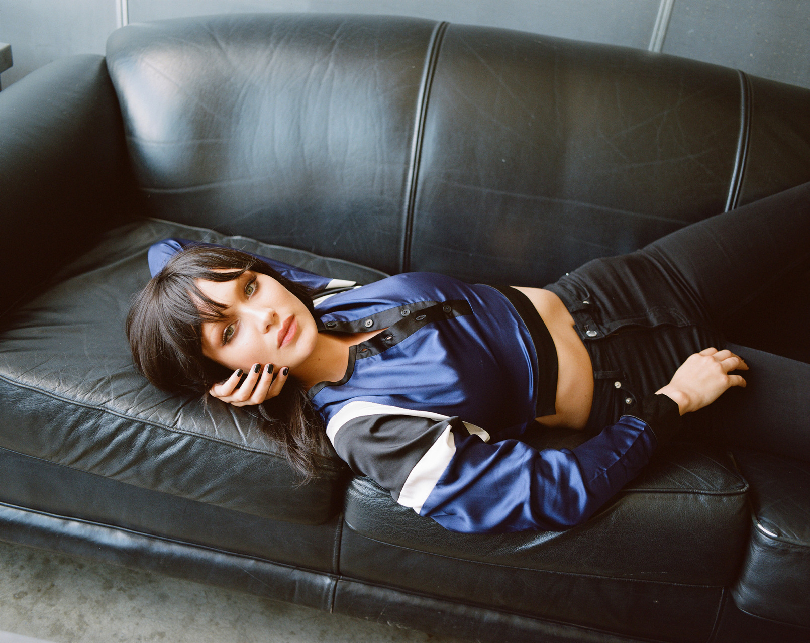 Bare Midriff Black Pants Lying Down Lying On Couch Dark Hair Green Eyes Closed Mouth Black Nails Pho 1612x1280