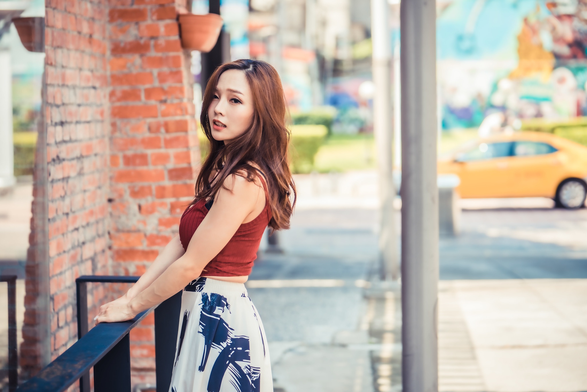 Asian Model Women Long Hair Brunette Red Tops Skirt Railings Taxi Bricks Wall Poles 2048x1366