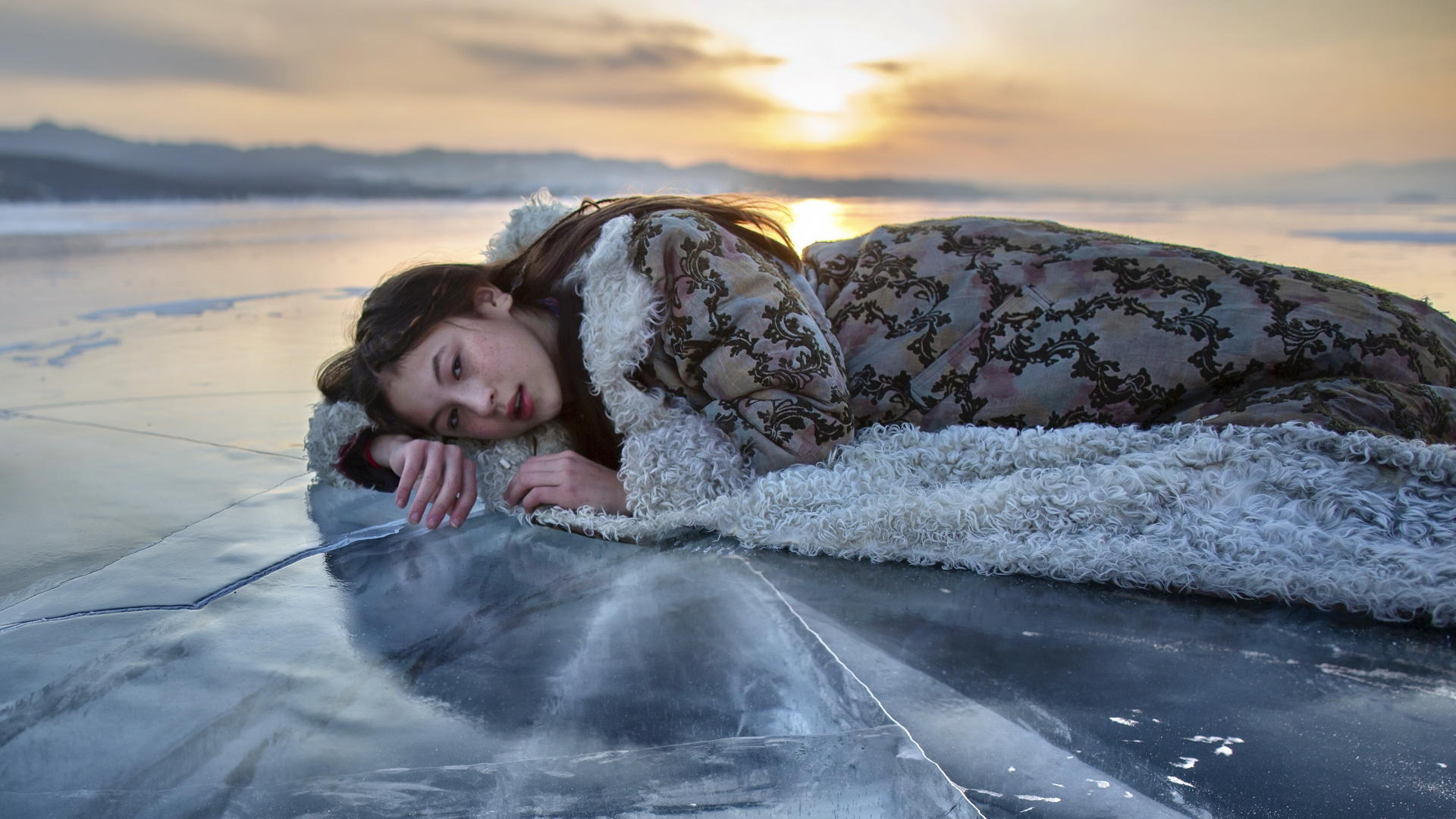 Asian Model Women Long Hair Brunette Lying Down Ice Depth Of Field Coats Sunset 1920x1080