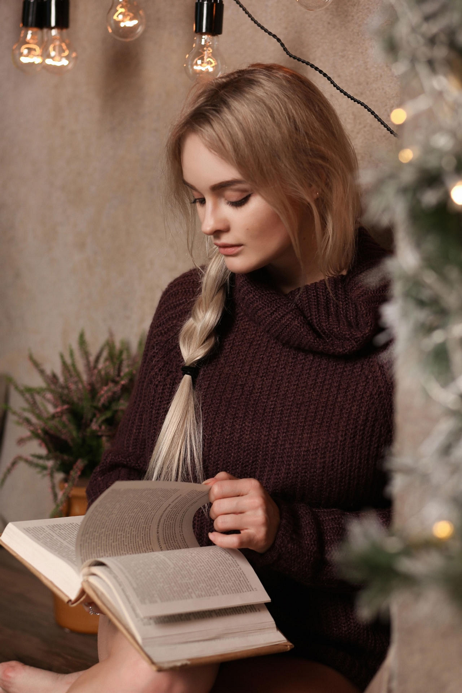Blonde Model Women Reading Brown Sweater Books Light Bulb Braids Looking Below Sweater Sitting 900x1350
