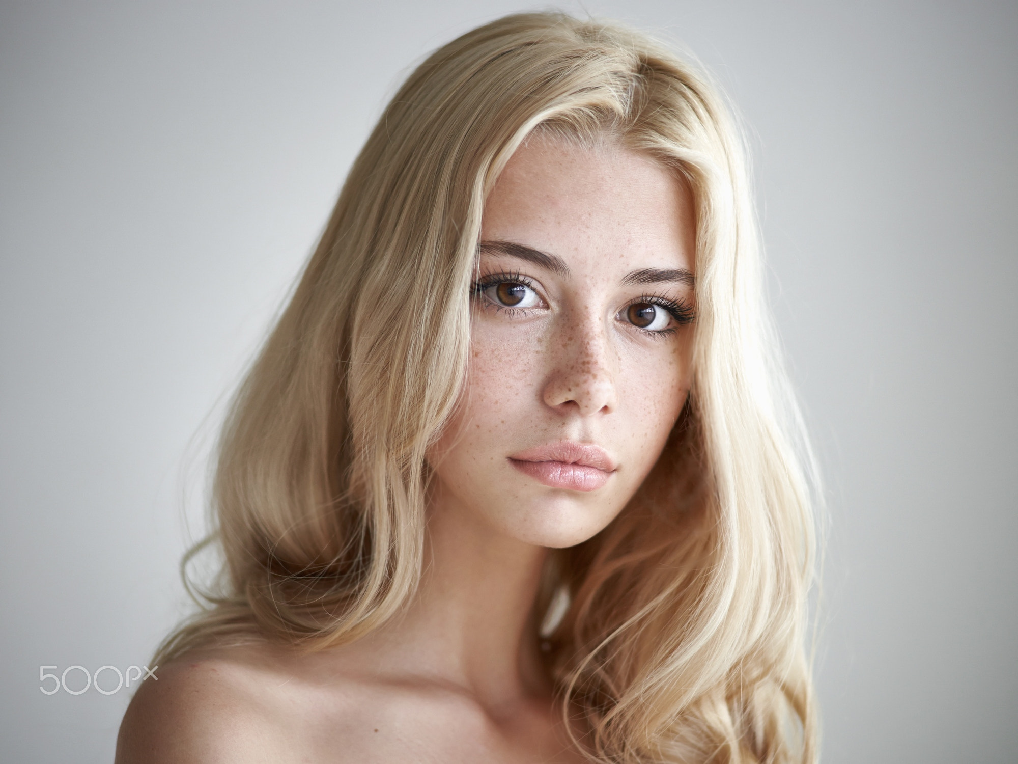 Portrait of a blonde woman with headshot - wide 7