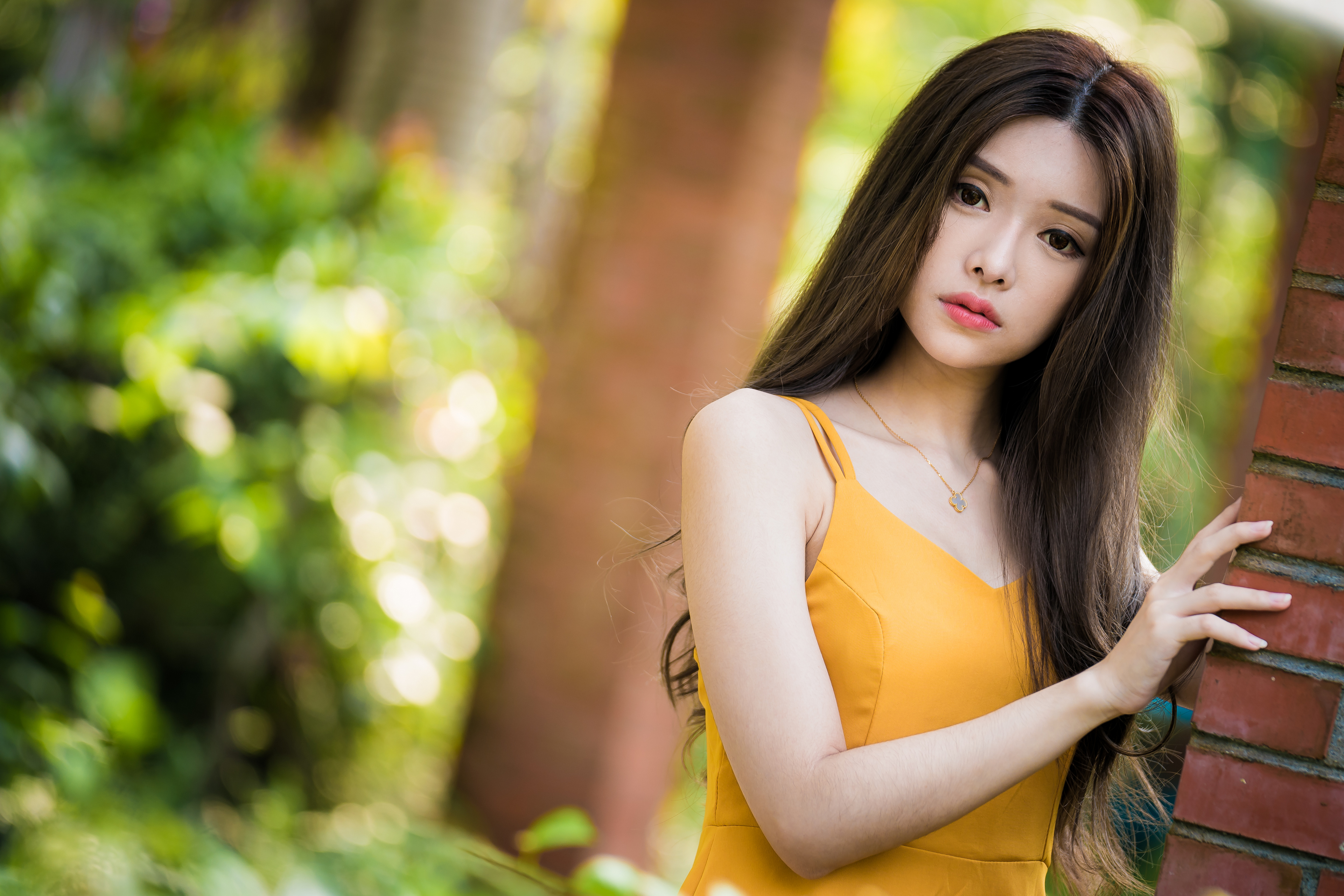 Asian Model Women Long Hair Brunette Yellow Dress Necklace Depth Of Field Bushes Column Bricks Leani 3840x2561