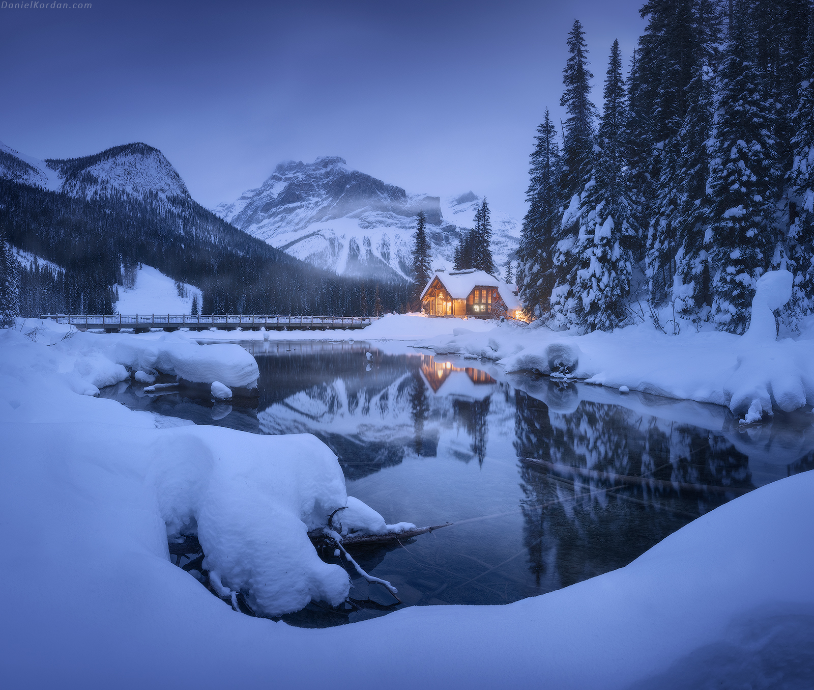 Winter Snow Snow Covered Ice Frozen River Water Reflection House Night Lights Forest Landscape Photo 1600x1355