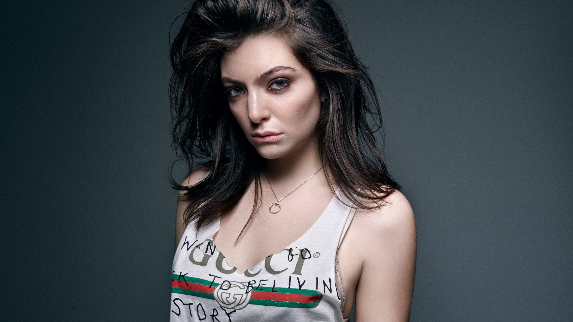 Lorde Women Music Gray Eyes Singer Brunette Looking At Viewer White Shirt Simple Background Dark Hai 2274x1280