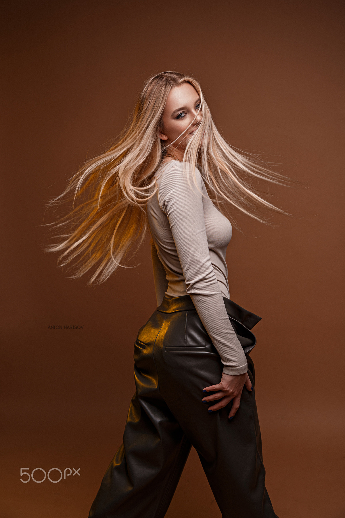 Anton Harisov Women Blonde Long Hair Pants Hair In Face Looking At Viewer Simple Background Portrait 1200x1800