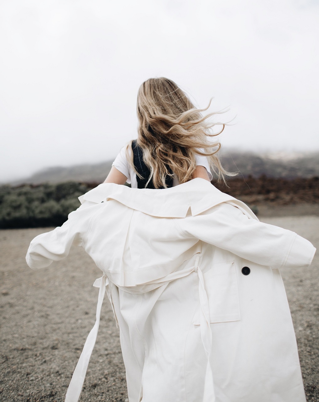 Women Long Hair Model White Coat Coats Windy Rear View 1015x1280