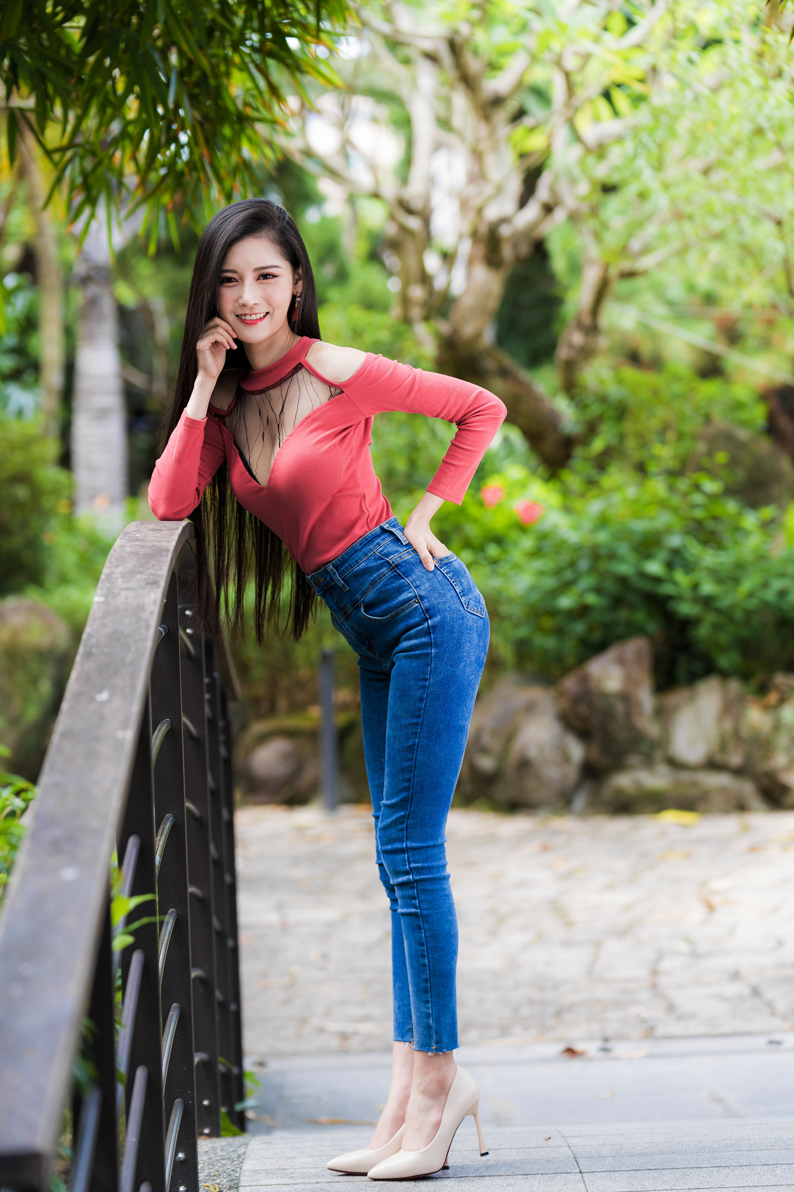 Asian Model Women Long Hair Dark Hair Jeans Red Shirt Leaning Railings Bushes Trees Depth Of Field W 2560x3840