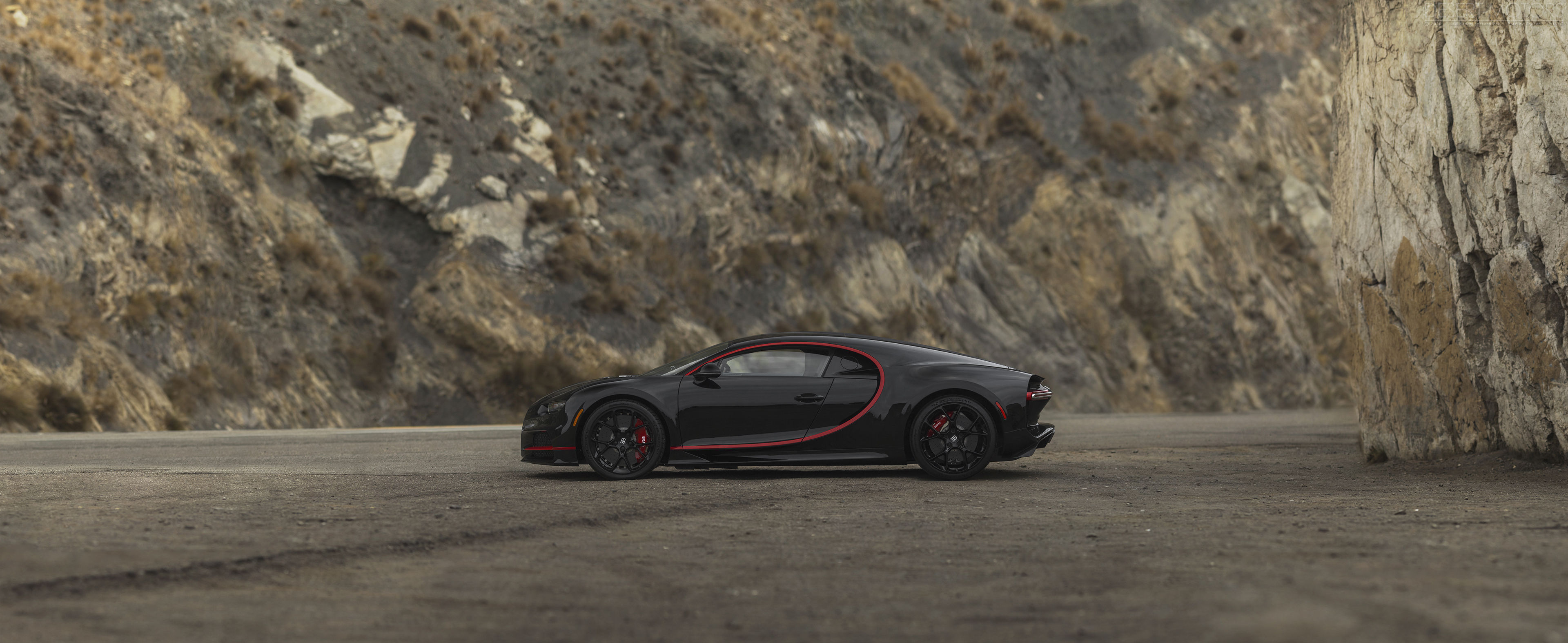 Buggati Bugatti Chiron Black Cars Hypercar Rocks Wall 3840x1575