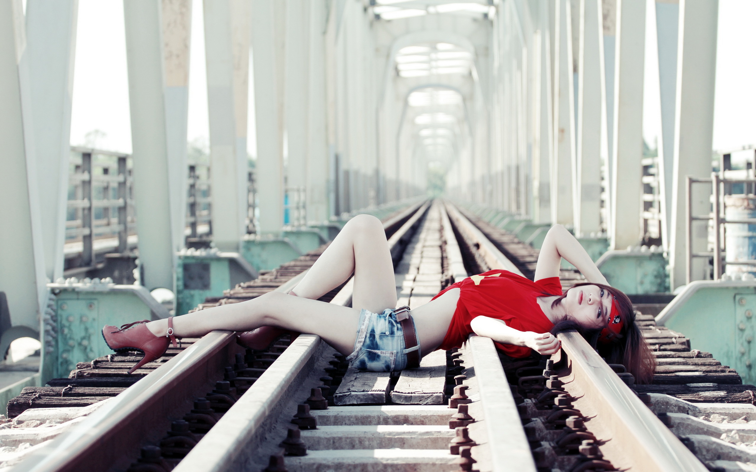 Asian Model Women Long Hair Dark Hair Depth Of Field Lying On Back Railroad Track Red Shirt Headband 2560x1600