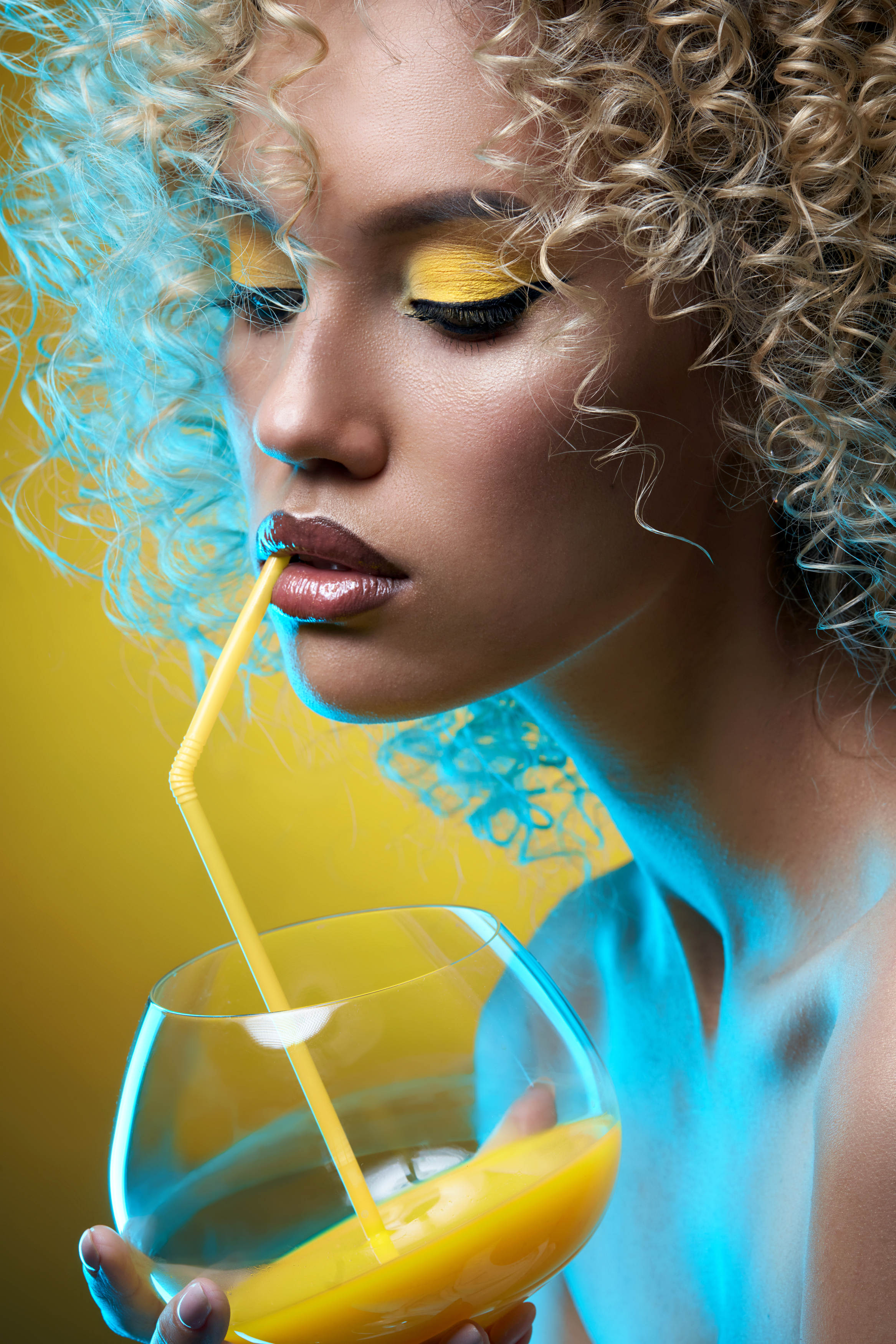 Evgenii Kirillov Women Blonde Curly Hair Makeup Eyeshadow Lipstick Drinking Juice Yellow Blue Light  2334x3500