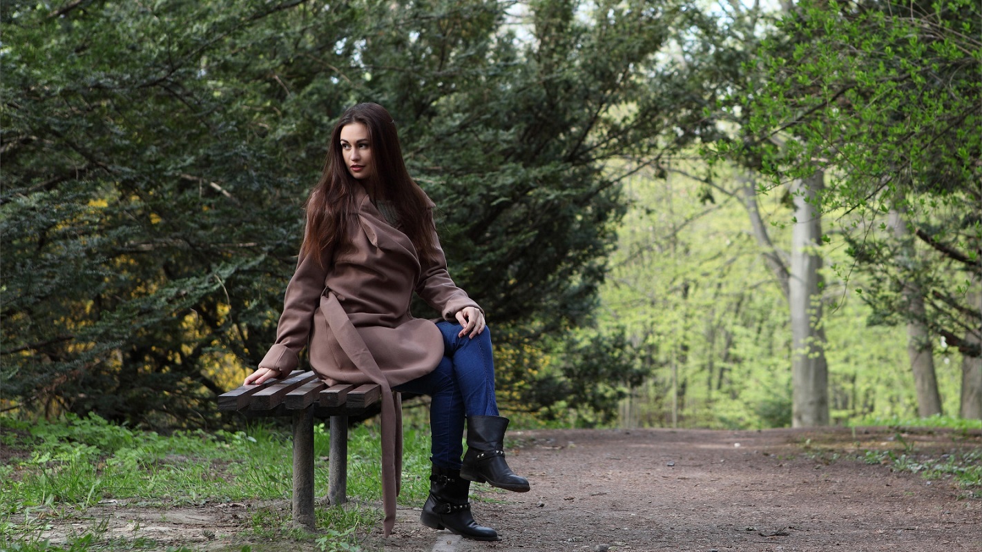 Women Model Sitting On Bench Coats 1422x800