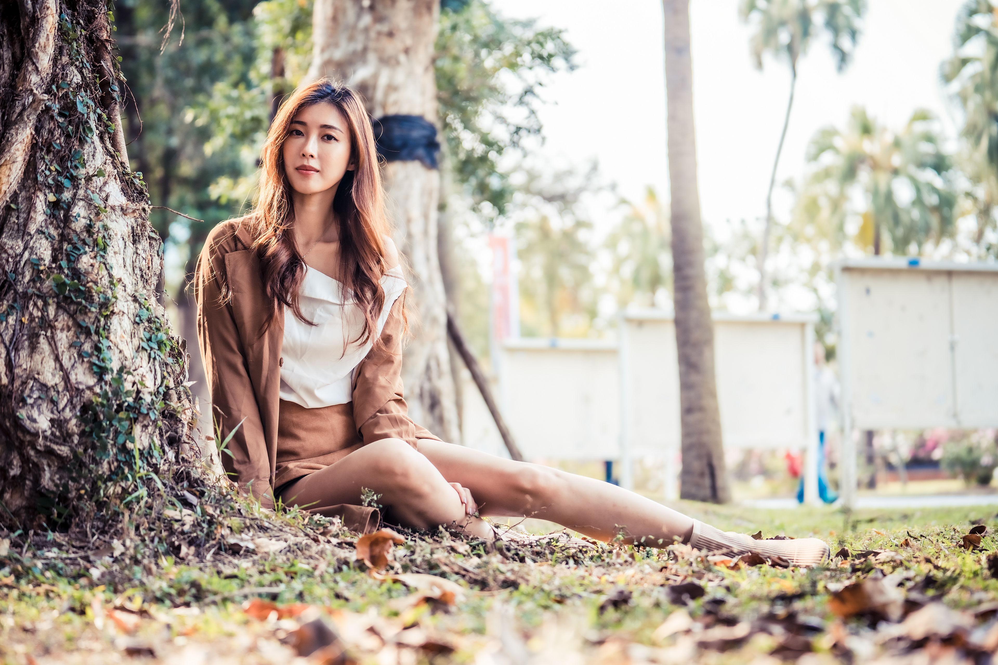 Asian Model Women Long Hair Brunette Women Outdoors Sitting Trees Leaves Depth Of Field Skirt Blouse 3840x2560