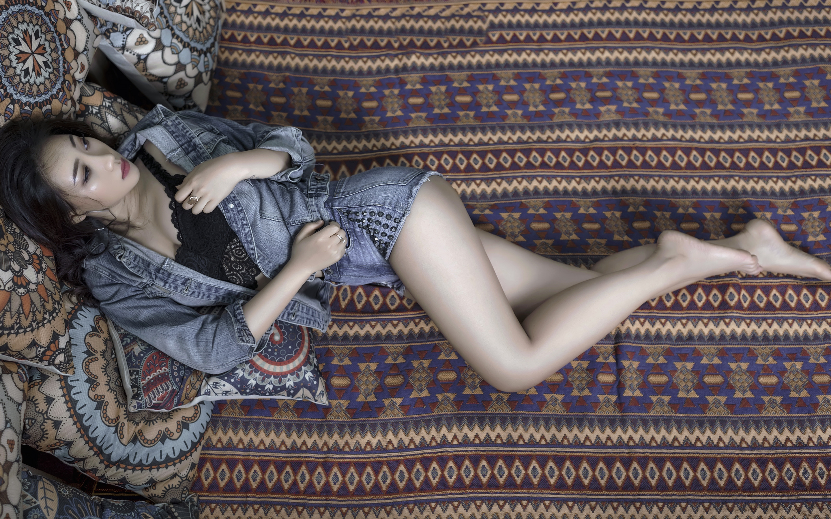 Asian Model Women Long Hair Dark Hair Lying Down Pillow Jeans Jacket Bed Barefoot Legs Black Top 2880x1800