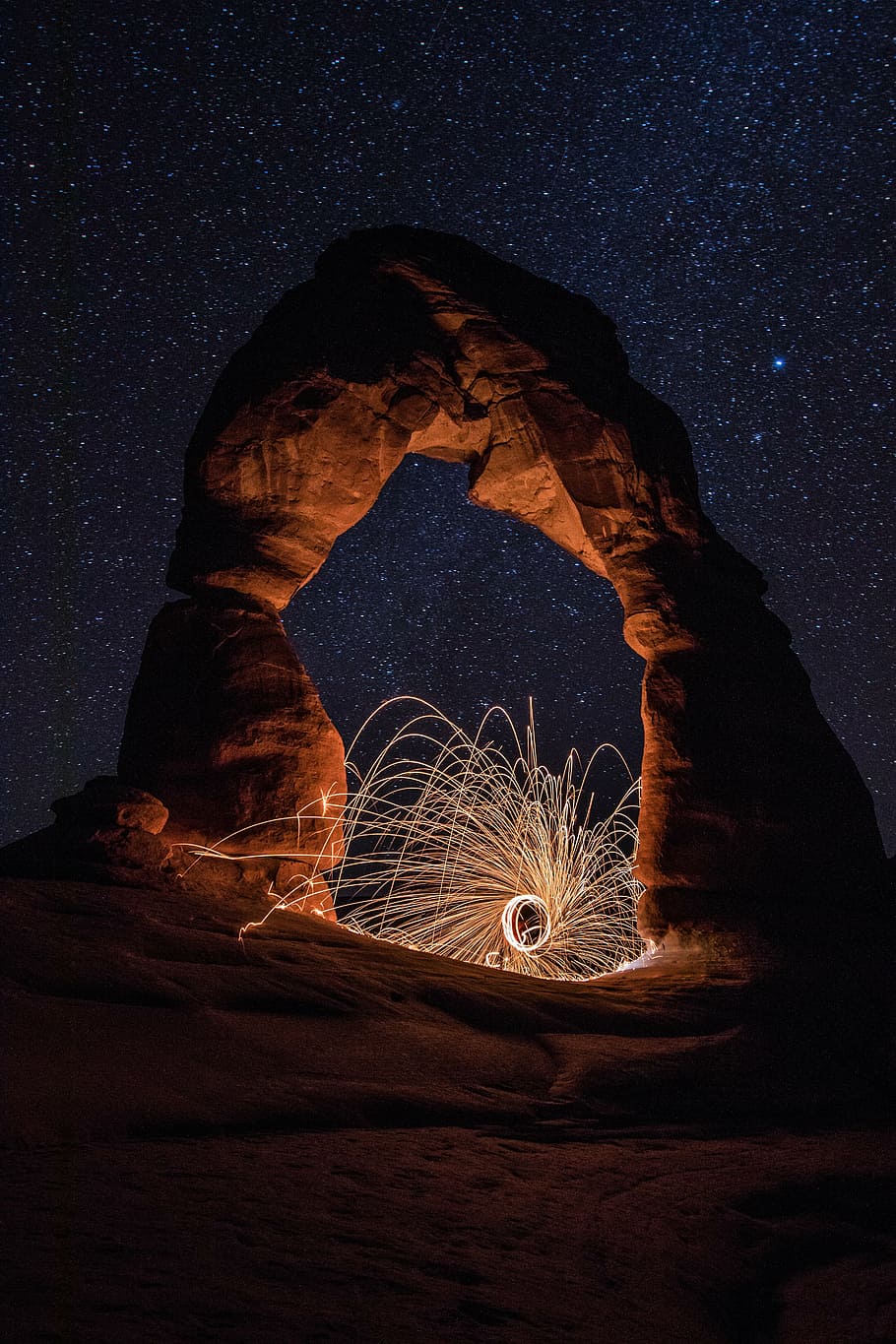 Nature Landscape Night Stars Dark Long Exposure Sparks Portrait Display Rock Arch Circle Utah USA Na 910x1365