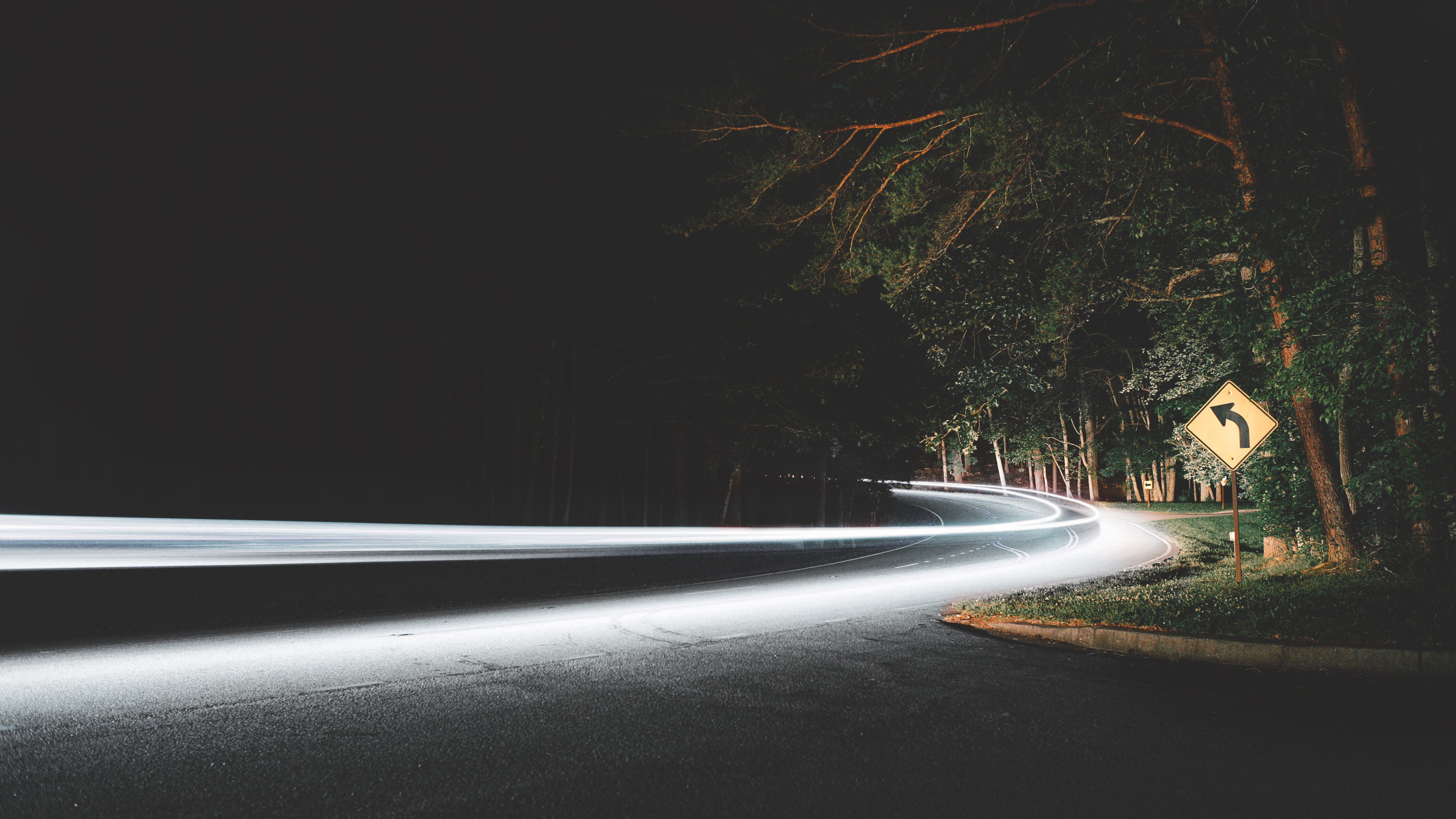 Long Exposure Headlights Road Road Sign Glowing Grass Curb Clay Banks 3000x1688