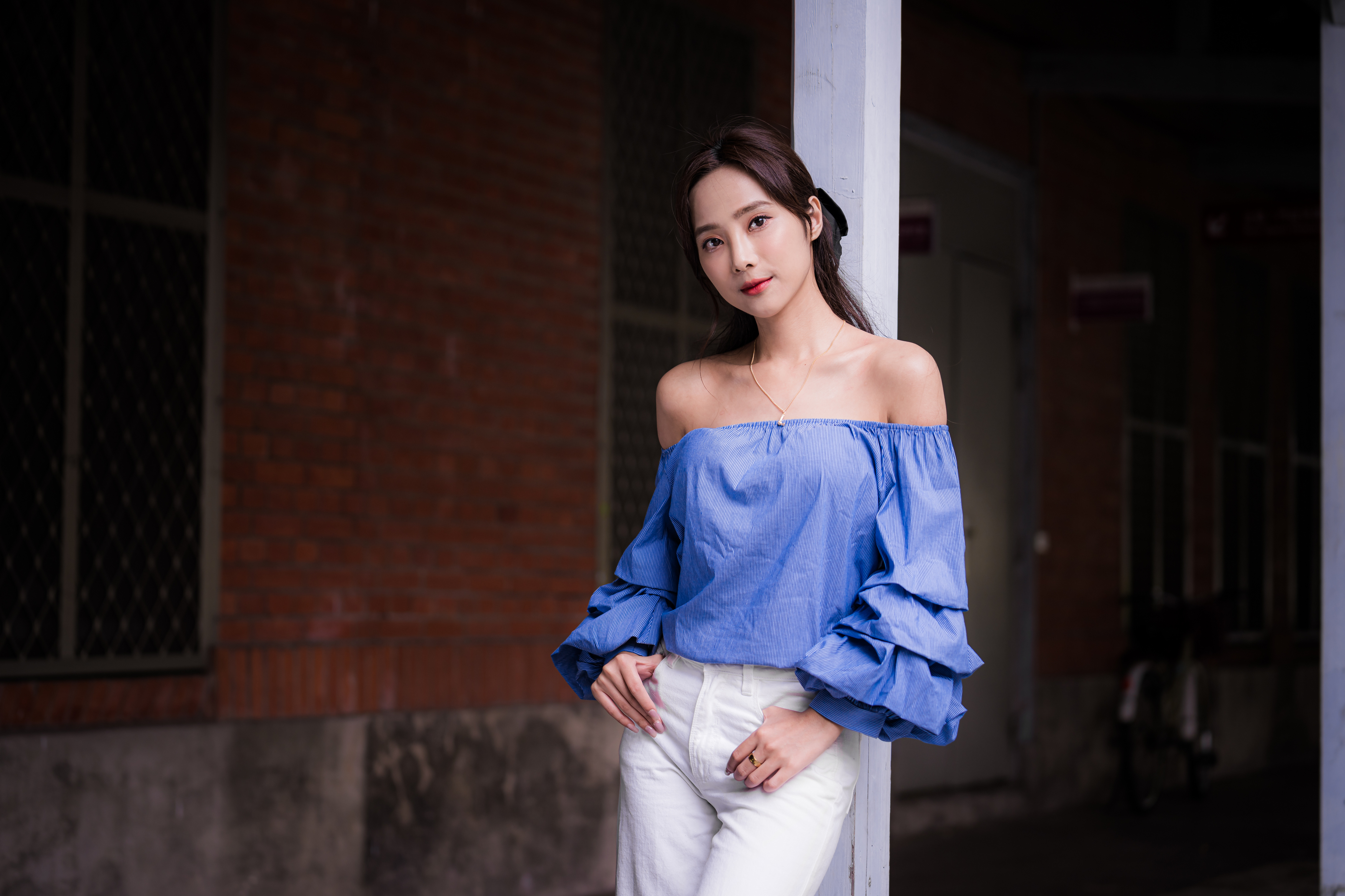 Asian Model Women Depth Of Field Long Hair Dark Hair Column Leaning Blue Blouse Bare Shoulders Pants 4562x3041