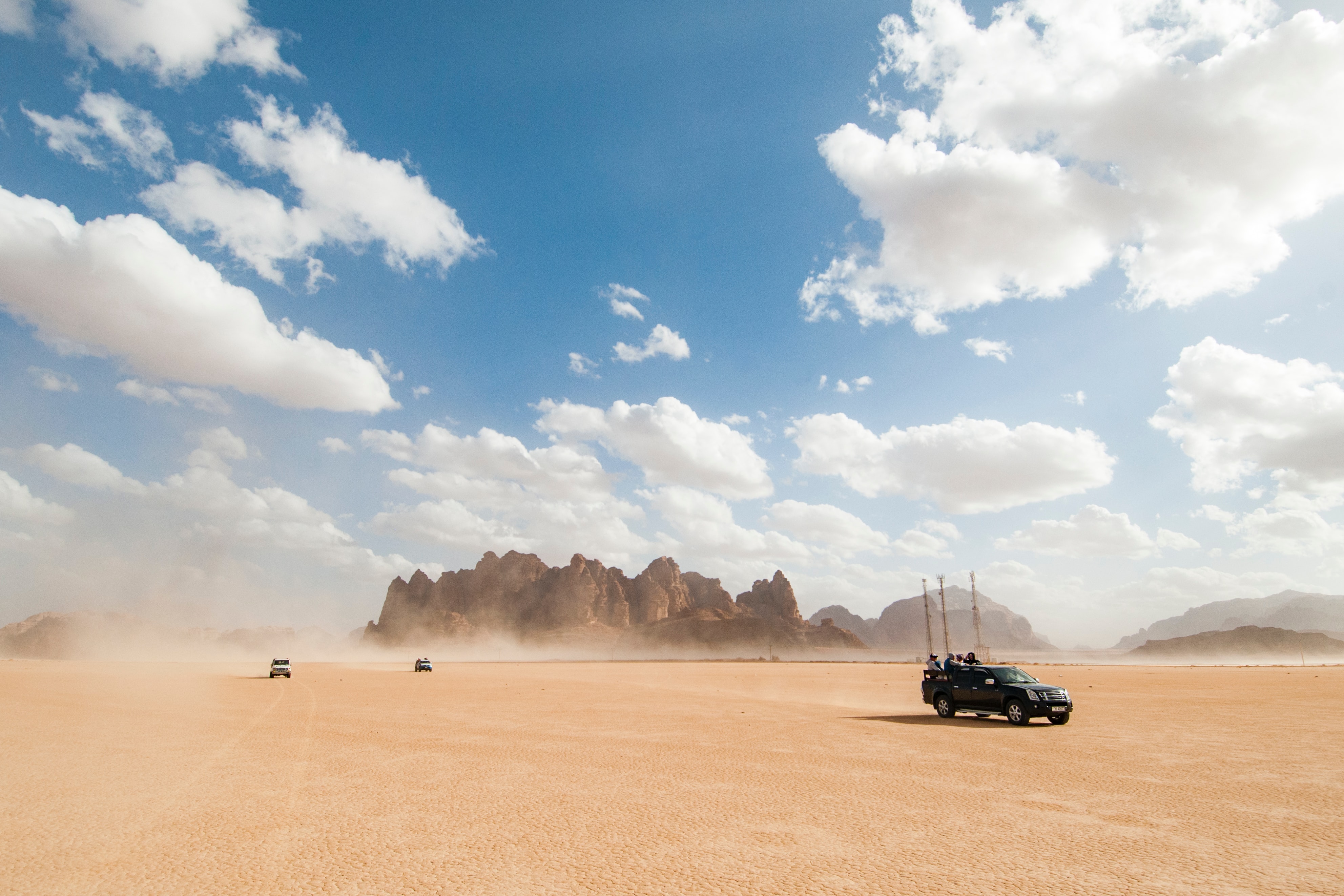 Rock Formation SUV Clouds Wadi Rum 3967x2645