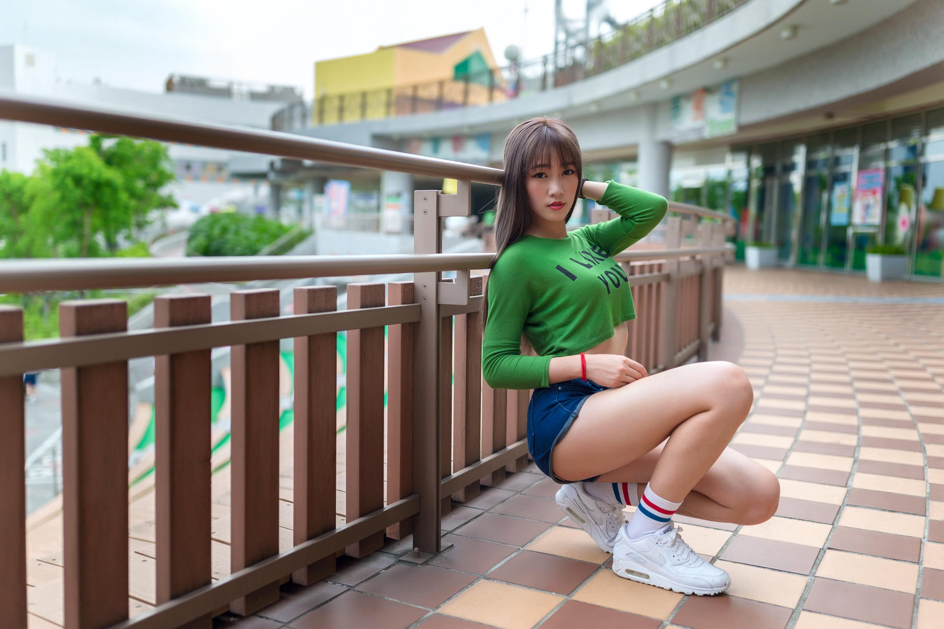 Asian Women Model Long Hair Dark Hair Leaning Sneakers Green Top Shorts Railings Depth Of Field Tile 1920x1280