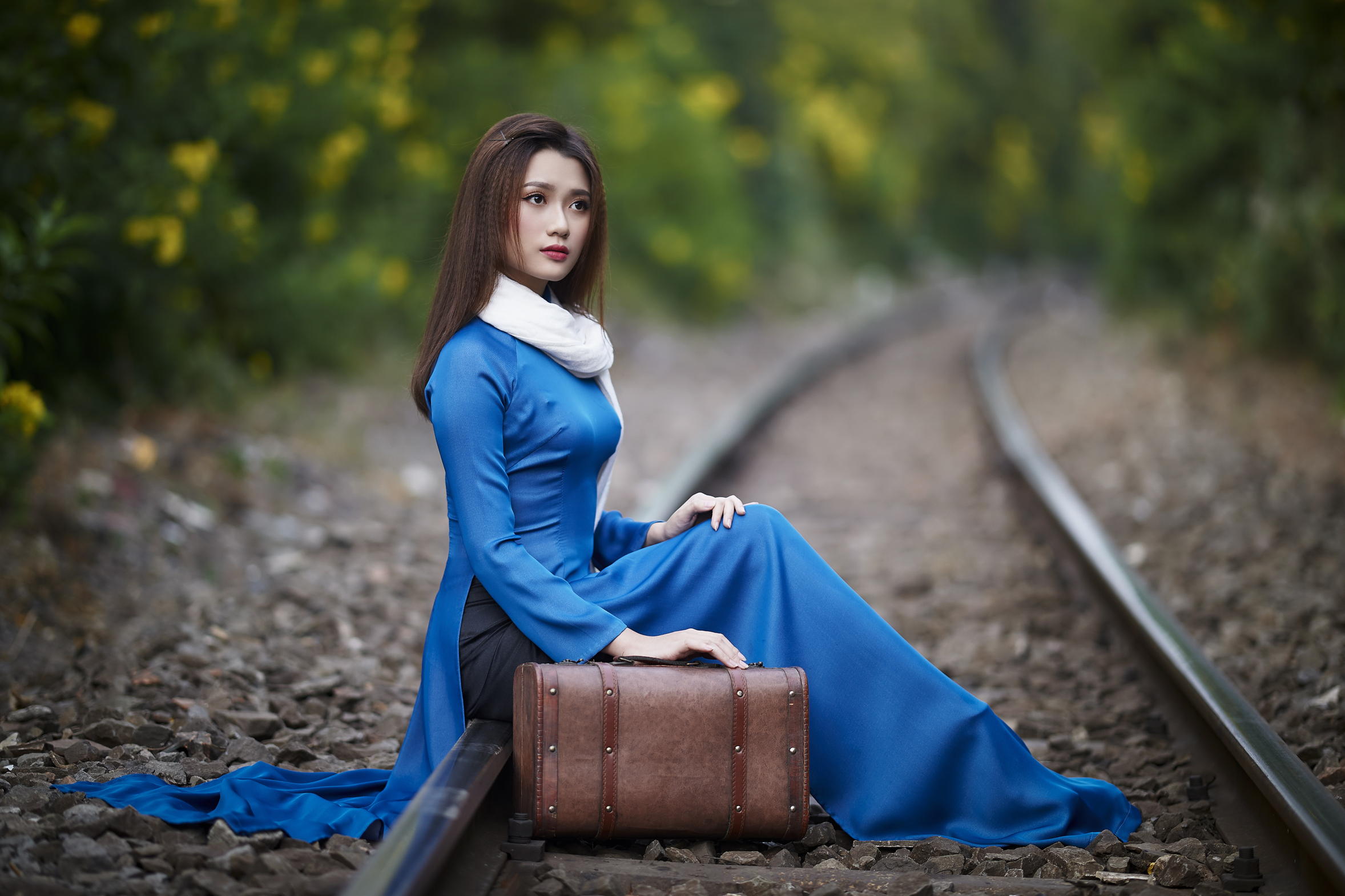 Asian Model Women Long Hair Dark Hair Depth Of Field Women Outdoors Sitting Railroad Track Suitcase  2356x1570