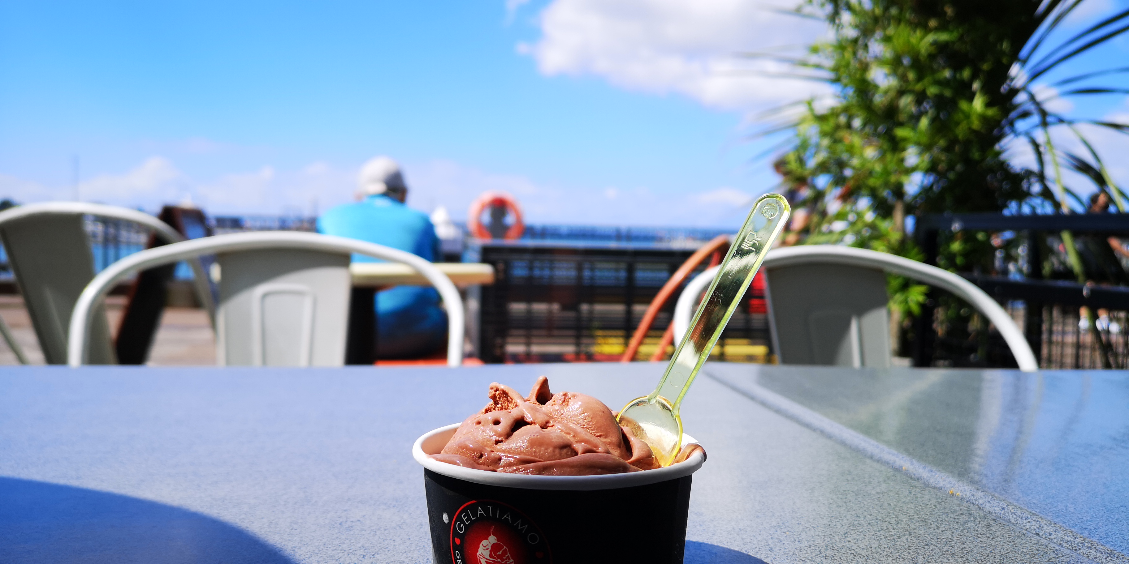 Auckland Ice Cream Still Life Spoon Leaves Clouds Table Chair Blurred Blurry Background 3648x1824