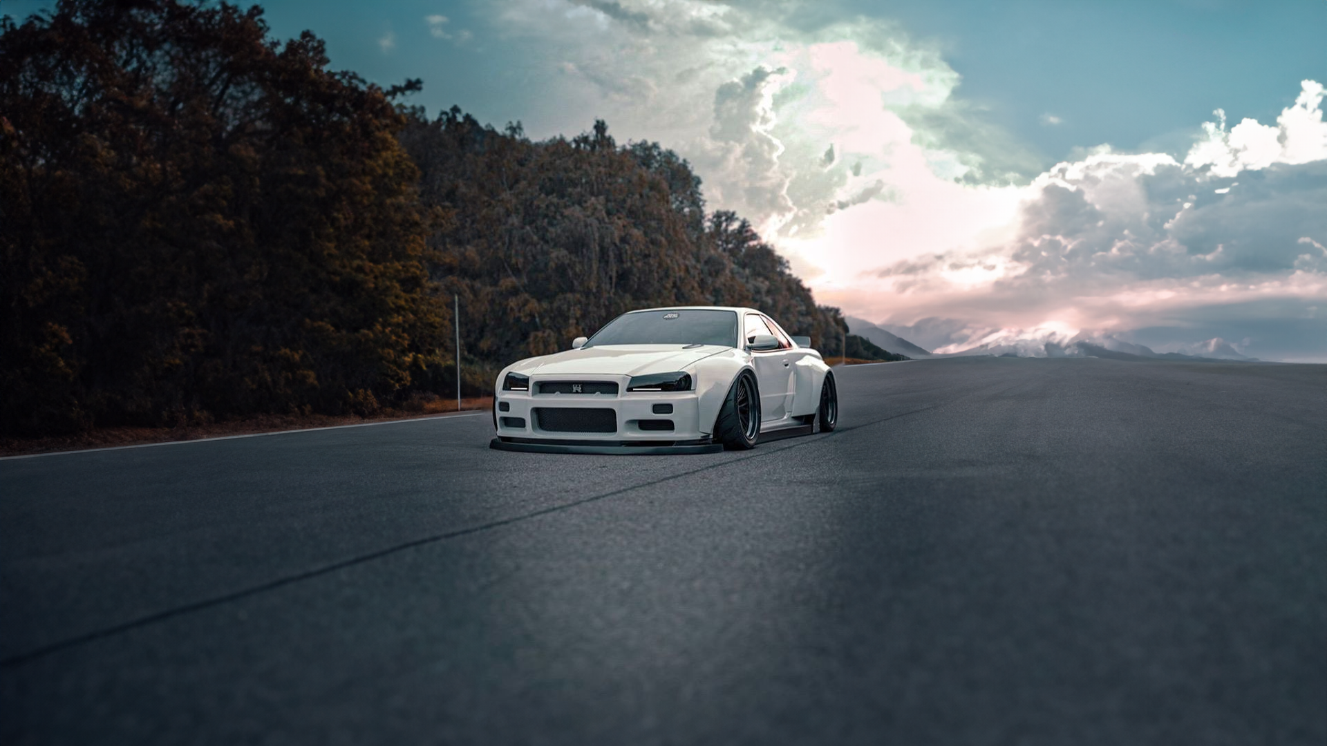 Nissan GT R Road Mountains Trees Car Front Angle View Sky Clouds 1920x1080