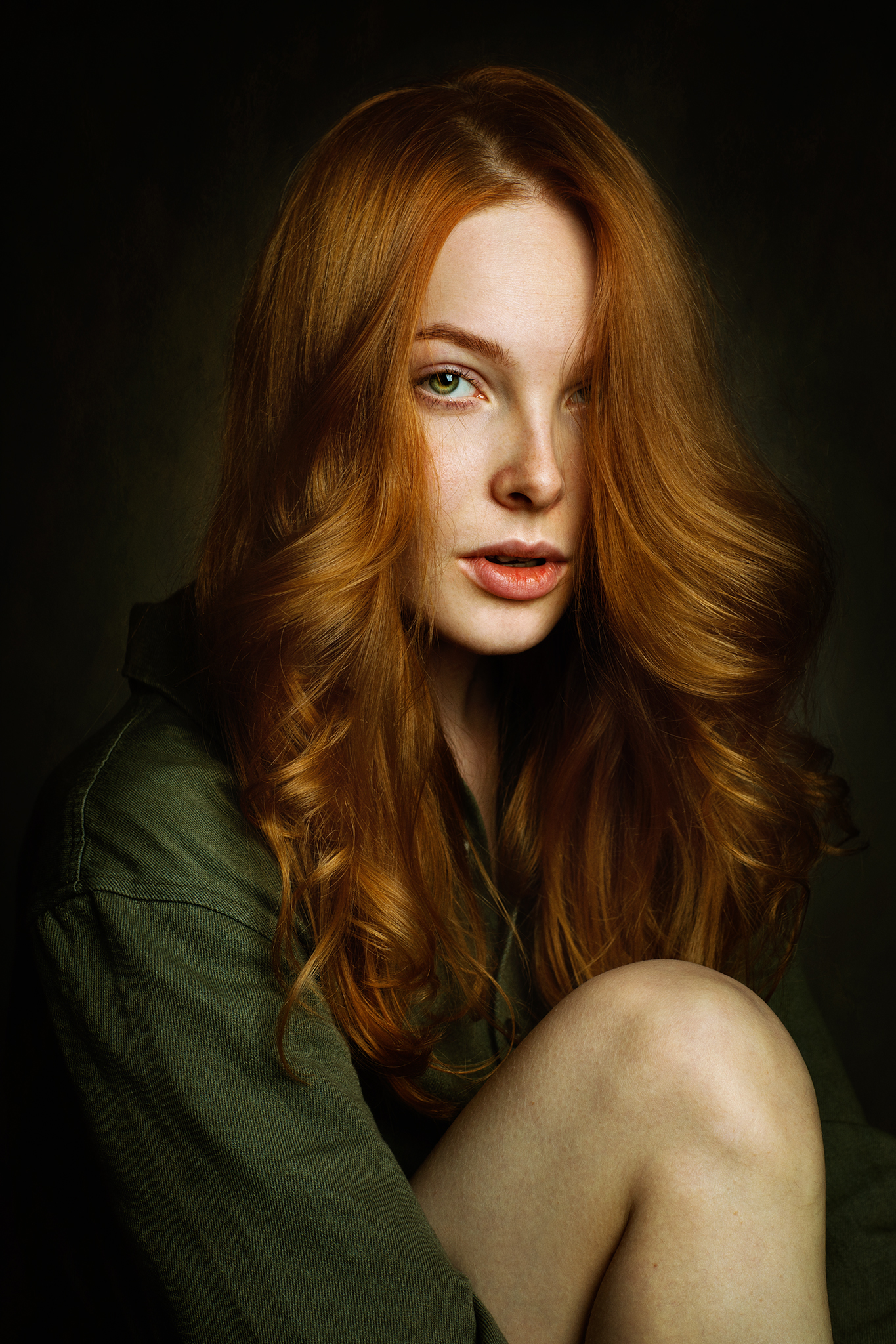 Zachar Rise Women Redhead Wavy Hair Green Shirt Holding Knees Portrait Simple Background 1365x2048