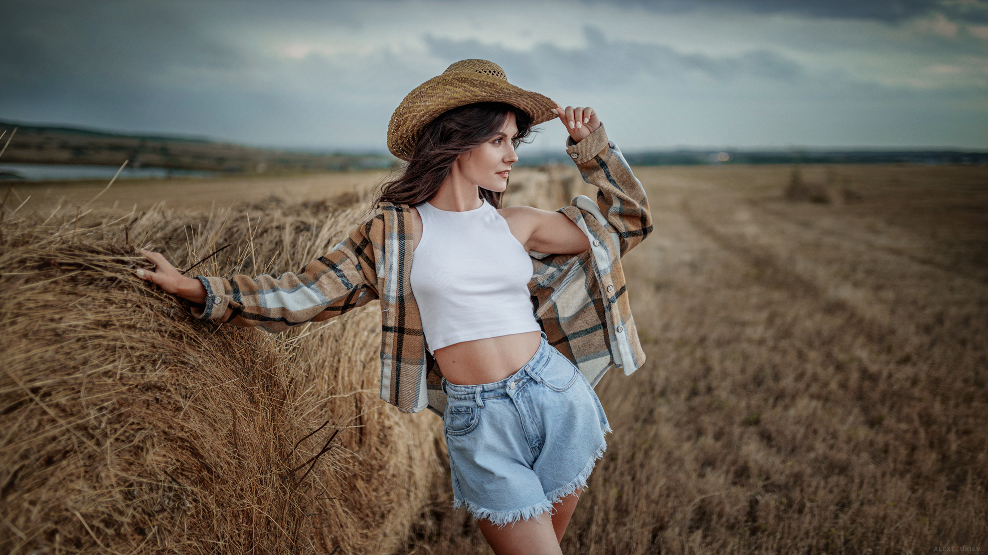 Aleksey Yuriev Women Hat Looking Away Brunette Wind Plaid Shirt Shorts Jeans Haystacks Field 1982x1115