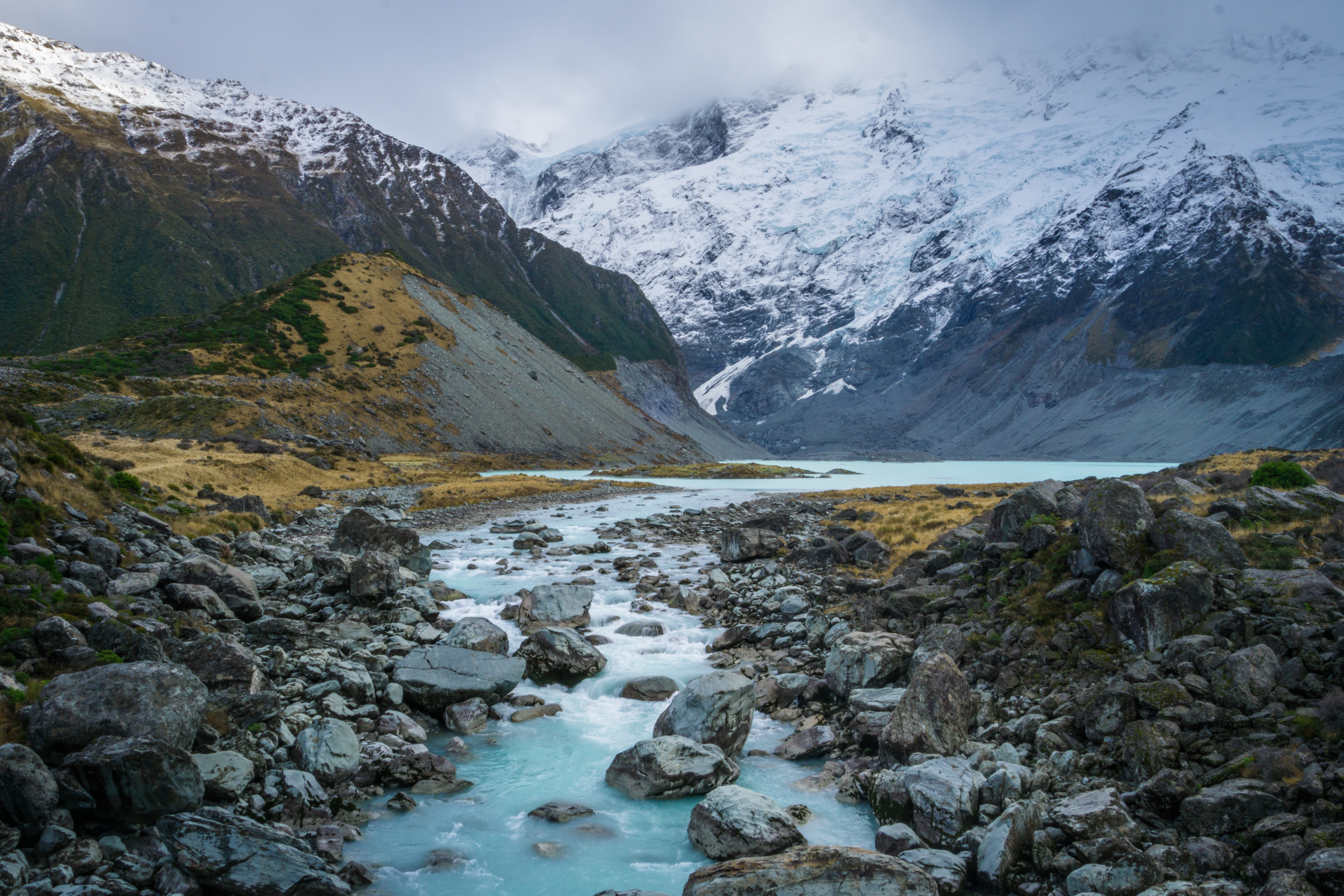 New Zealand Hooker Lake Stream Rocks Mount Cook Water Nature Mountains Snow 3645x2430