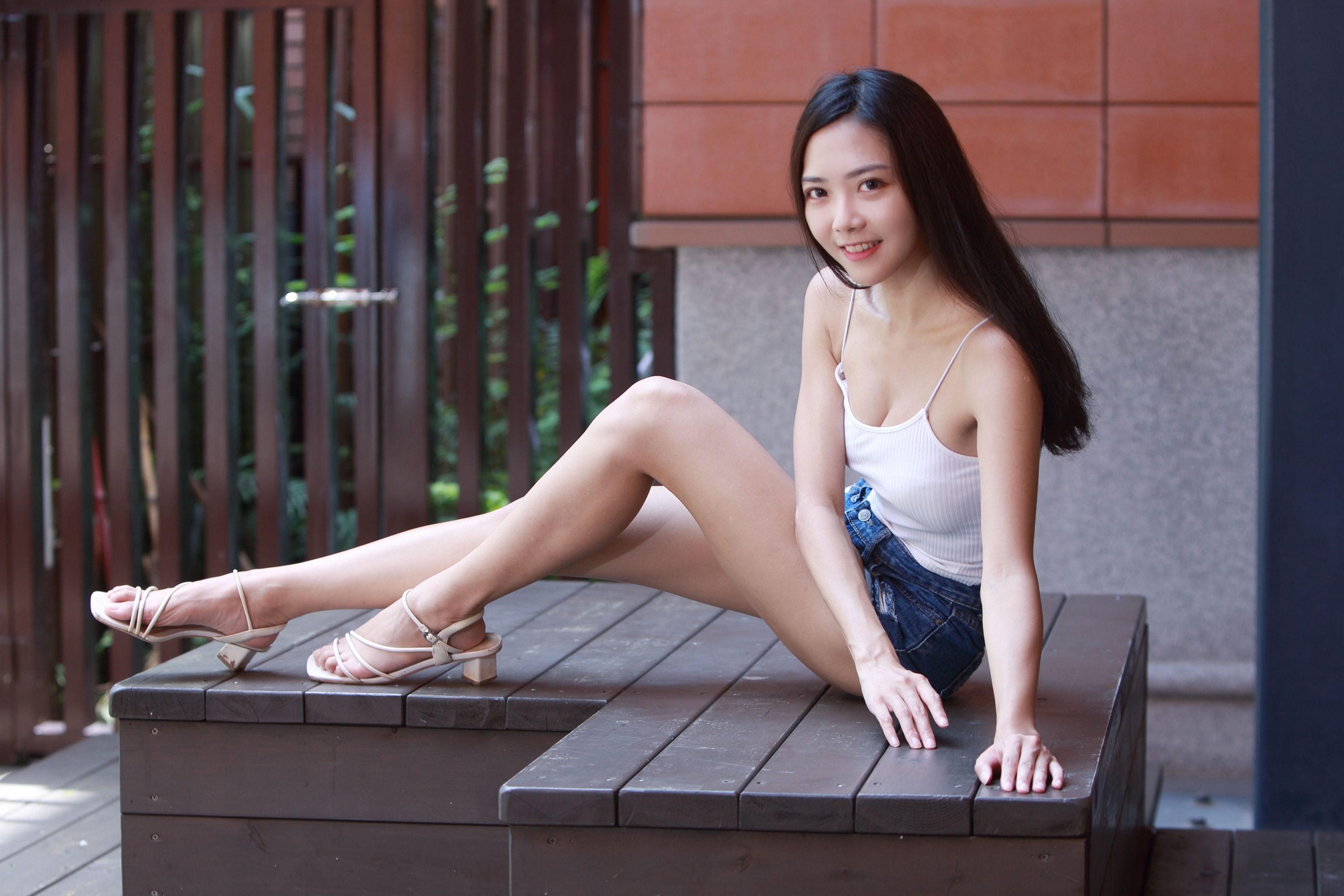 Asian Model Women Dark Hair Long Hair Sitting Barefoot Sandal Bench Jean Shorts White Shirt Fence Do 3840x2560