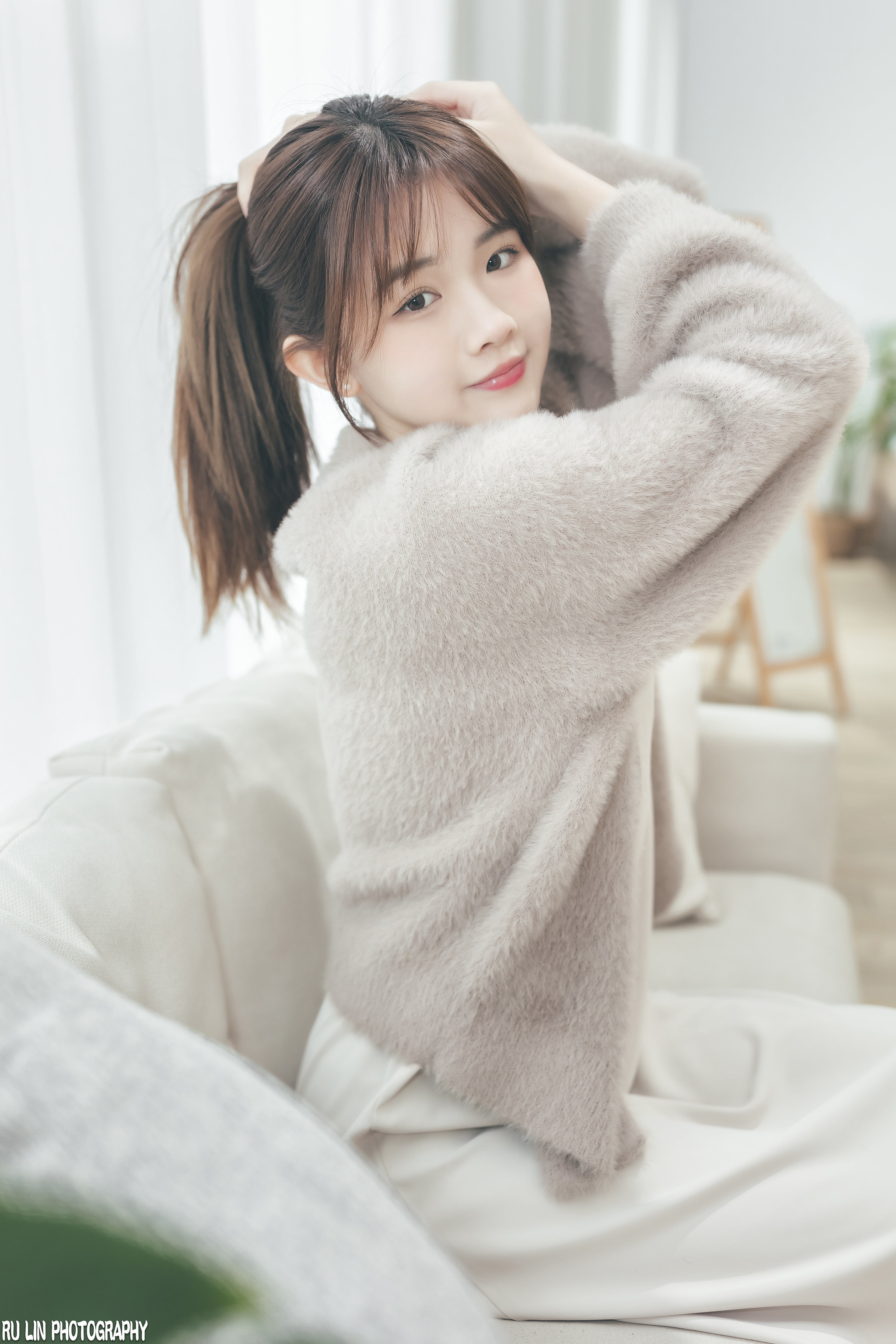 Ru Lin Women Asian Brunette Sweater Couch 2048x3072