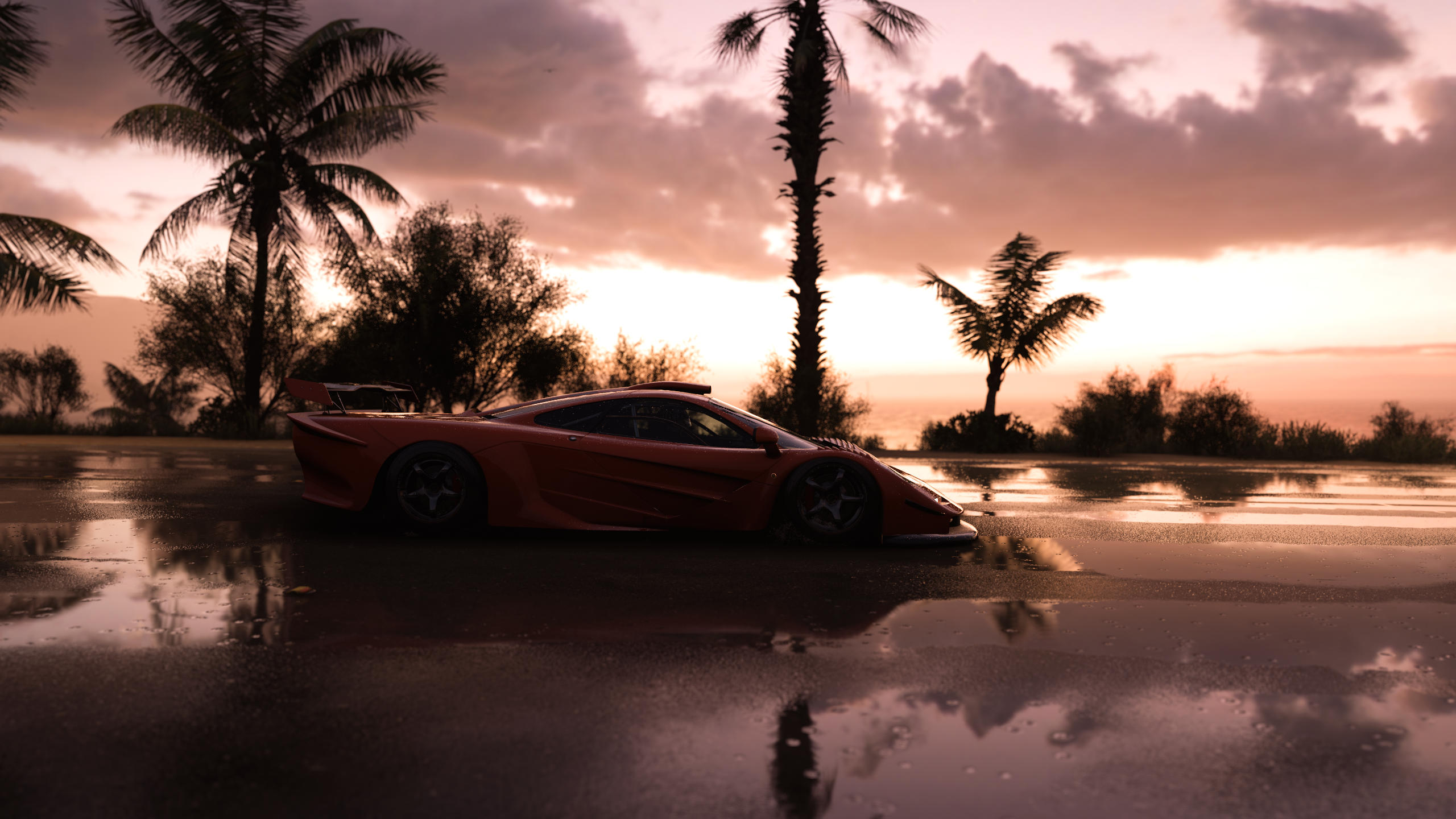 Forza Horizon 5 McLaren F1 Sunset Video Games Sunset Glow Palm Trees Reflection Water Sky Clouds Car 2560x1440