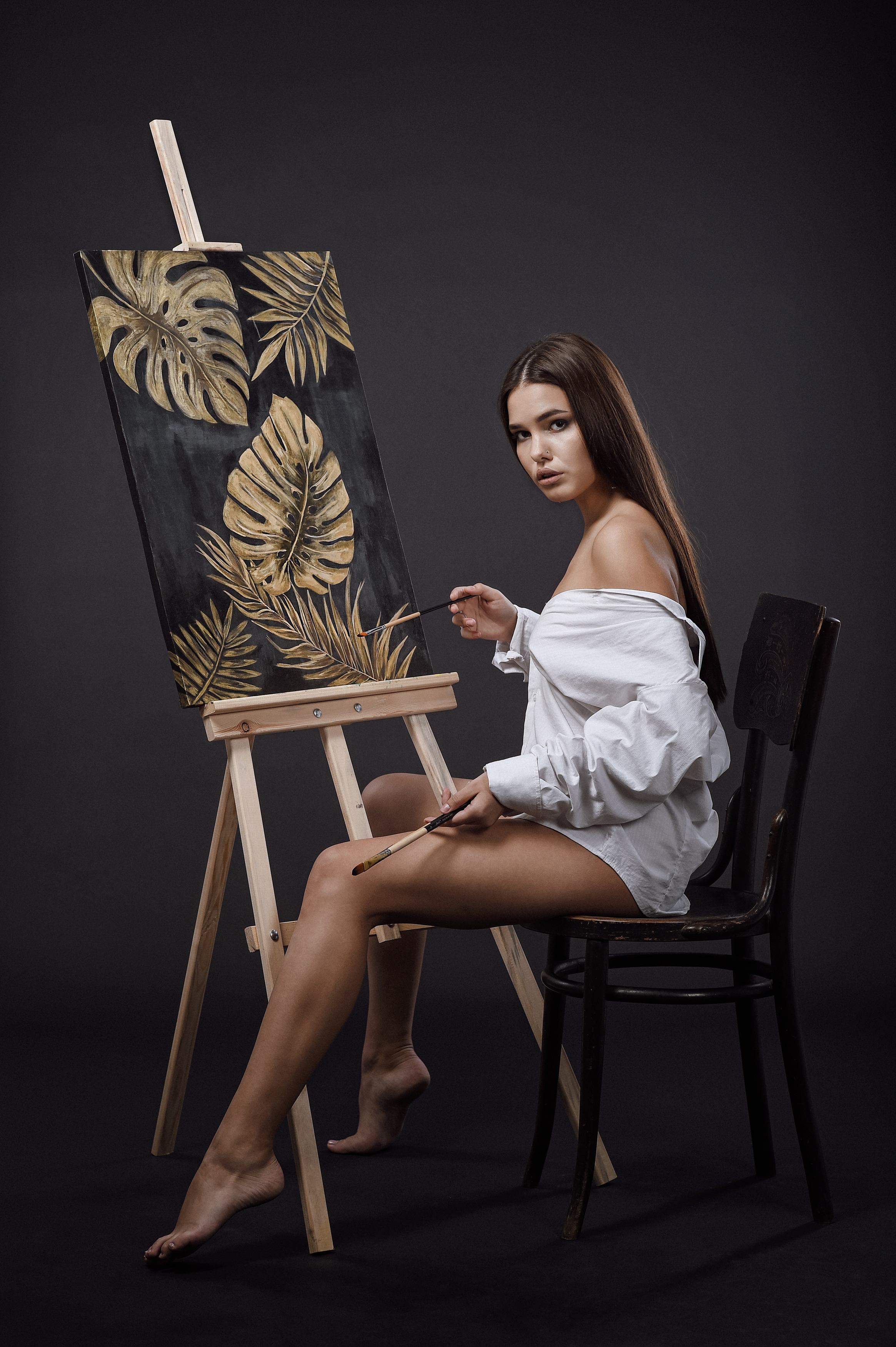Women Model Brunette Long Hair Women Indoors Chair Painting Barefoot Shirt Bare Shoulders Looking At 2329x3500