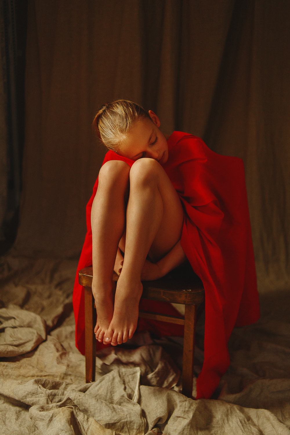 Anton Zhilin Women Red Holding Knees Barefoot Studio 1000x1500