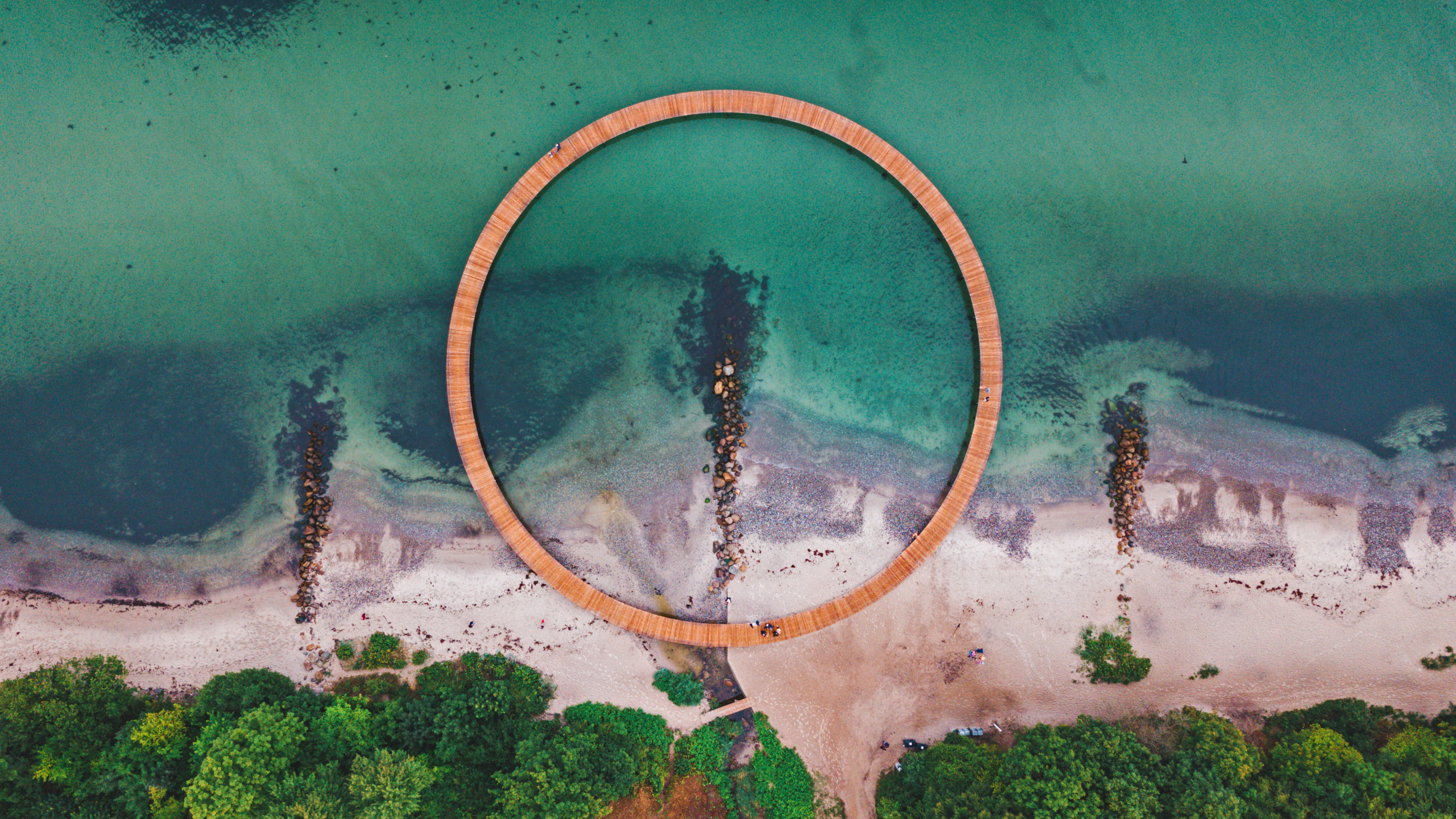 Water Nature Wooden Bridge Wooden Walkway Rocks Sea Trees Plants Sand Beach Tourist Attraction Drone 2560x1440