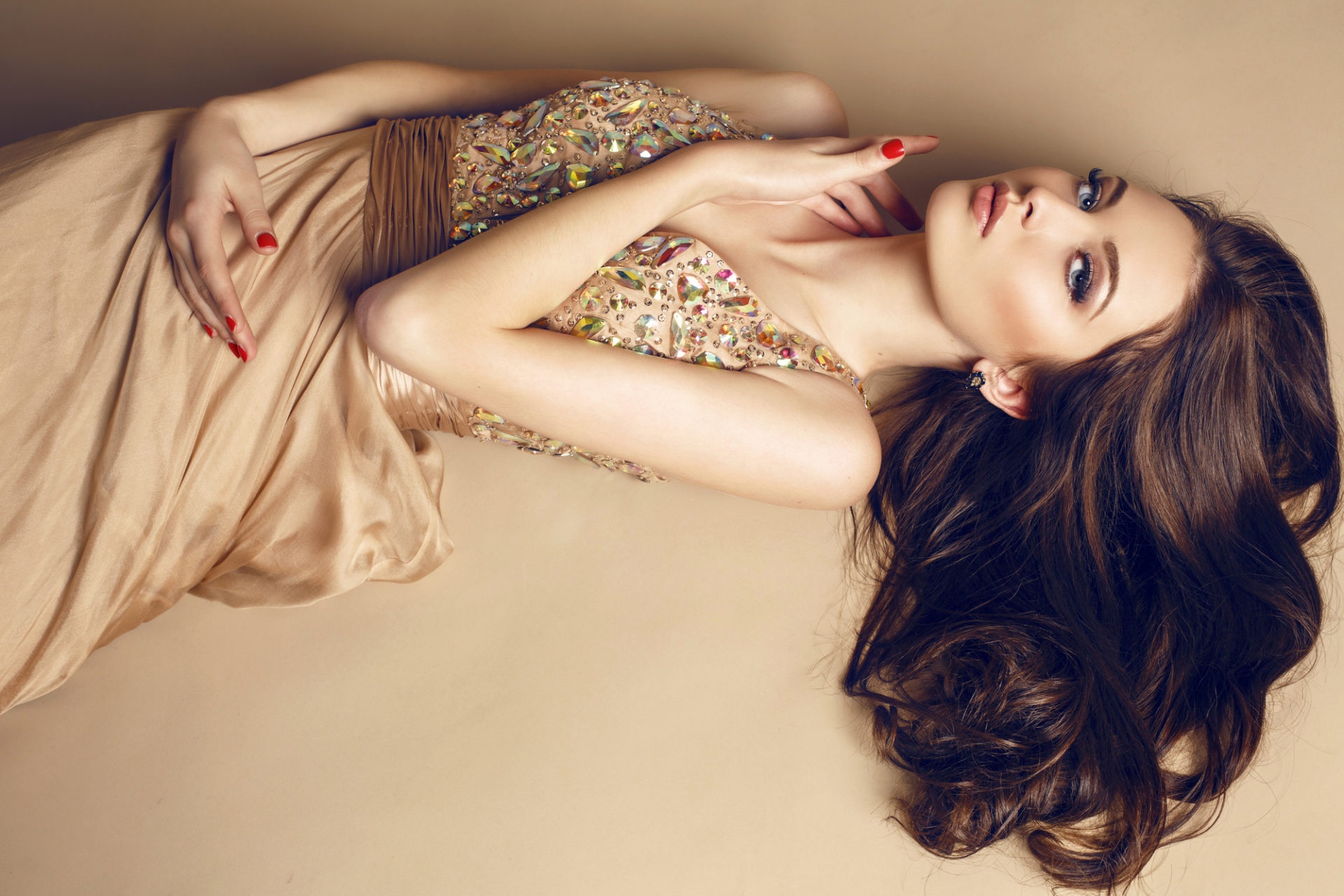 Model Red Lipstick Painted Nails Brown Dress Long Hair Lying Down Looking At Viewer Studio Blue Eyes 1920x1280