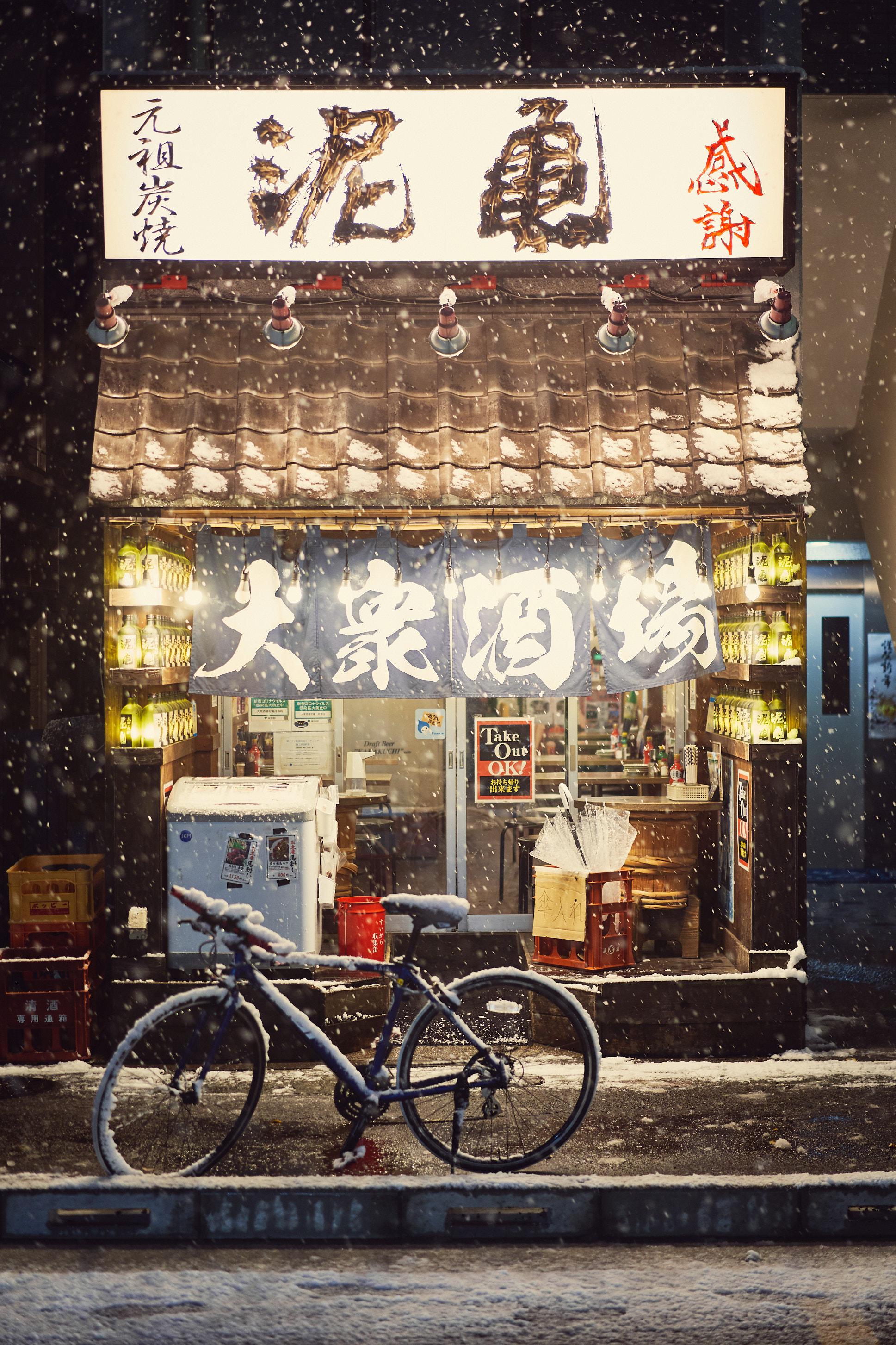 Building Urban City Portrait Display Night Japan Winter Snow Street Bicycle Stores Snowing 1937x2906