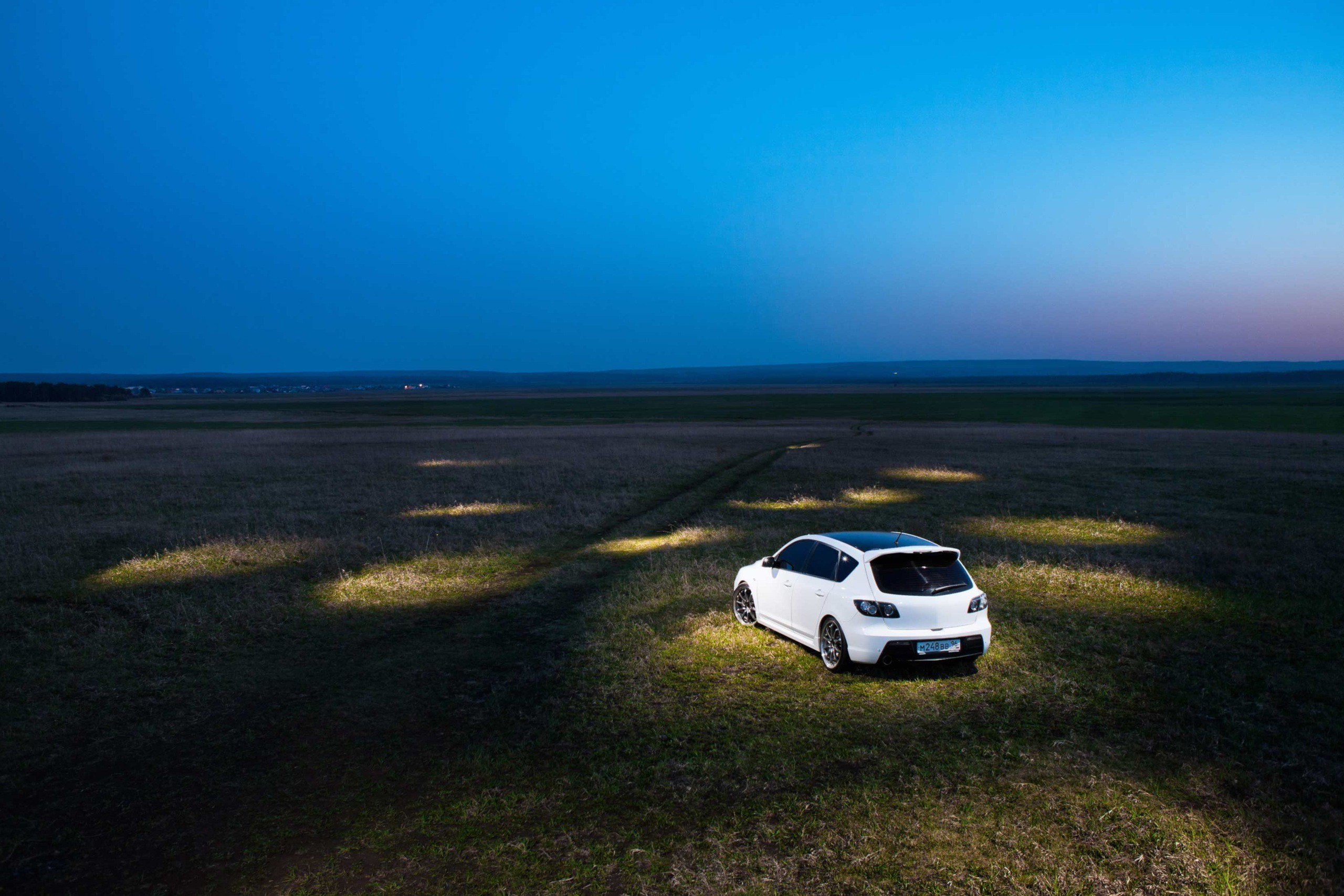 Car Vehicle Outdoors White Cars Numbers Flashlight Field Evening Plains Photography Blue Dirt Road 2560x1707