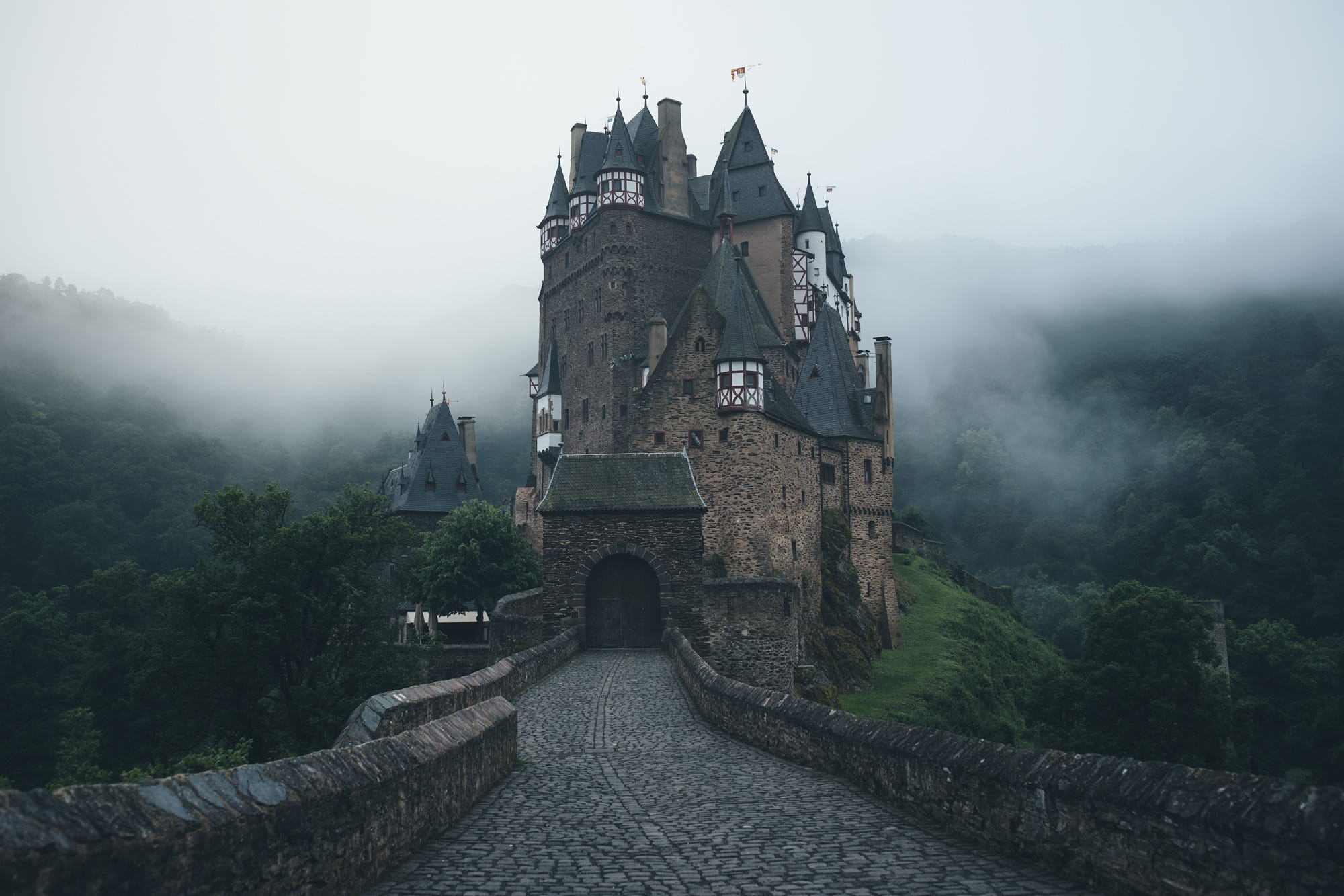 Castle Eltz Castle Trees Germany Forest Bricks Tower Mist Hills Morning Cobblestone Stones Landscape 2000x1333