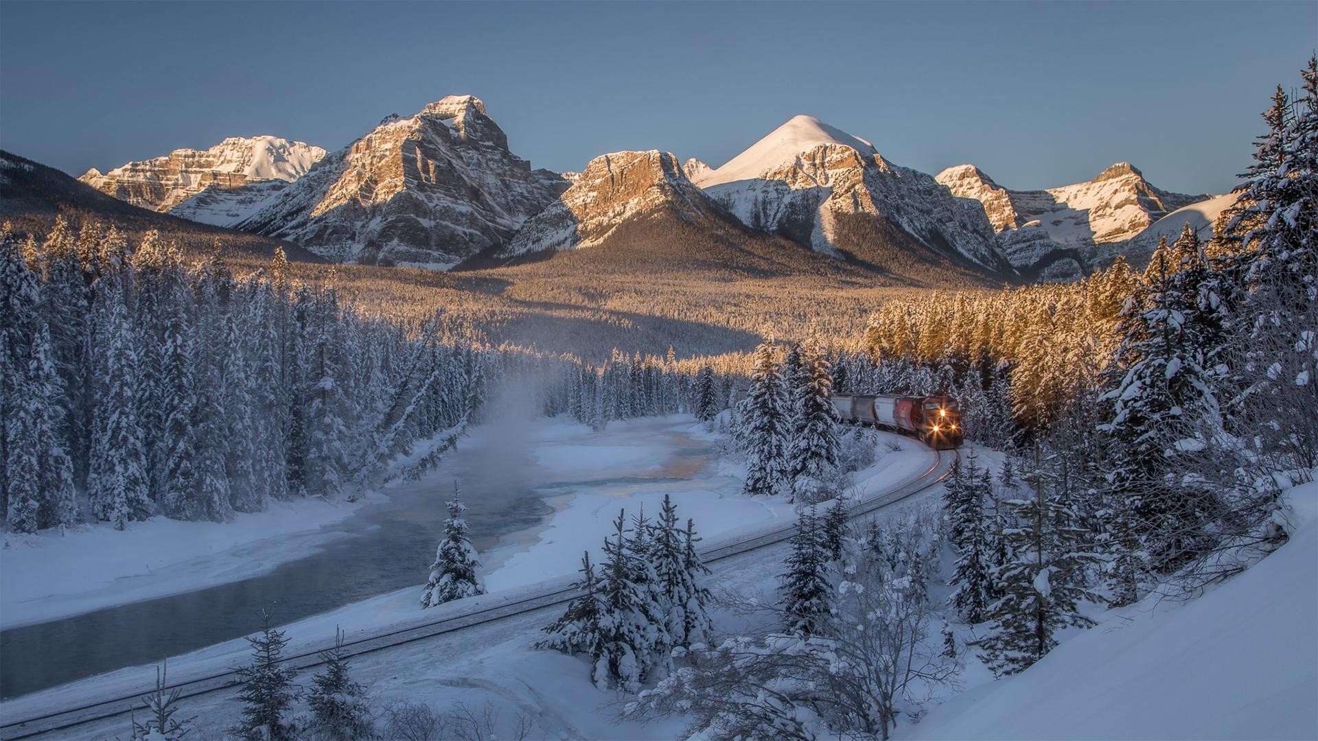 Mountains Snow Railway Freight Train Forest Trees Pine Trees Canada Canadian Dusk 1920x1080