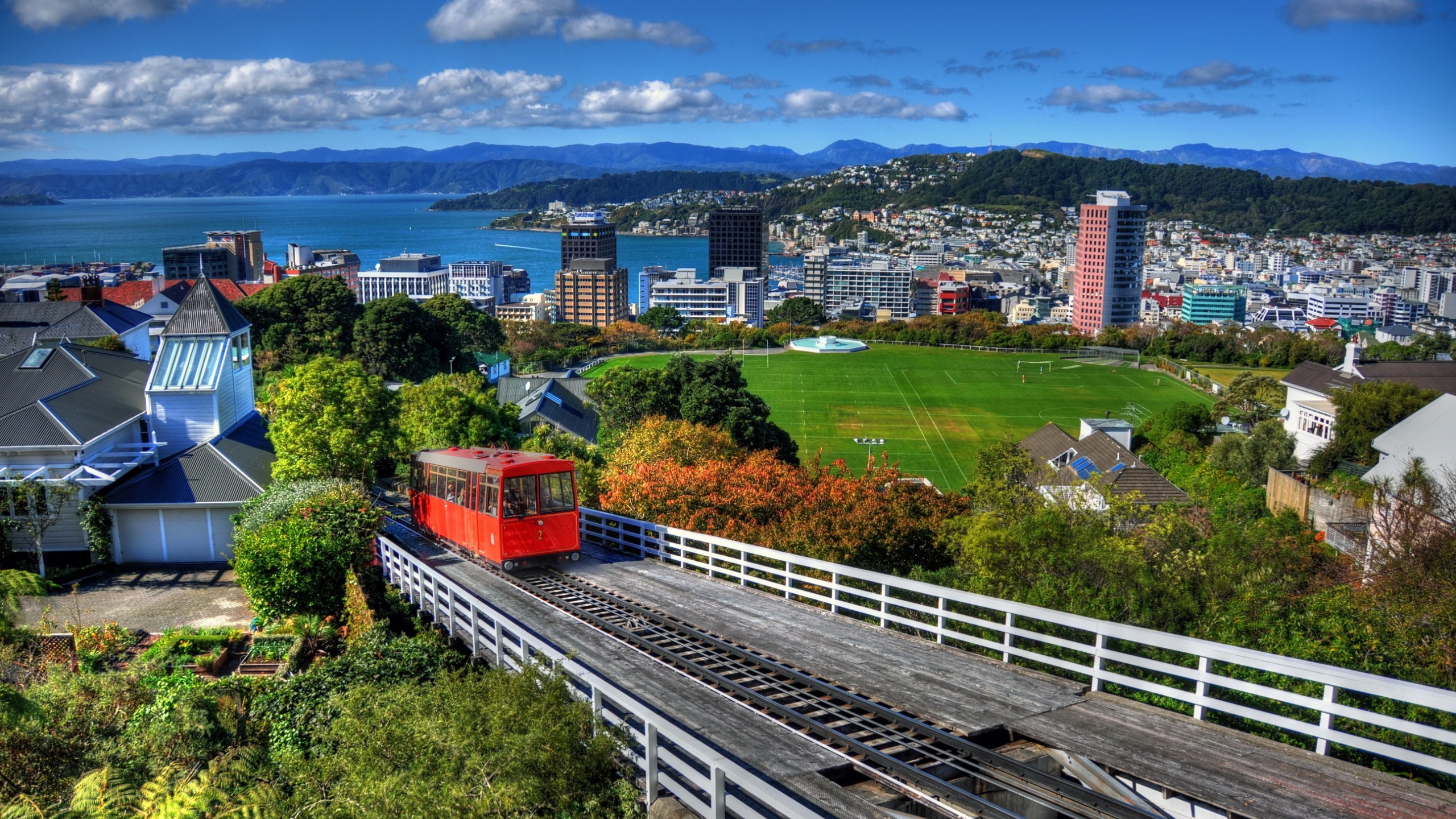 Architecture Building Wellington New Zealand City Cityscape Train Hills Soccer Field Clouds House Tr 2560x1440