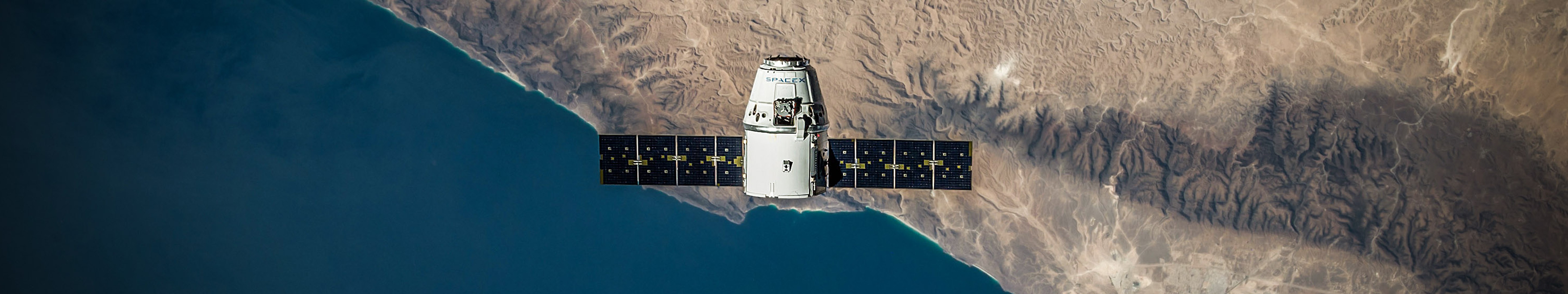 SpaceX ISS Suply Ship Satelites Shore Water Desert Space 5760x1080
