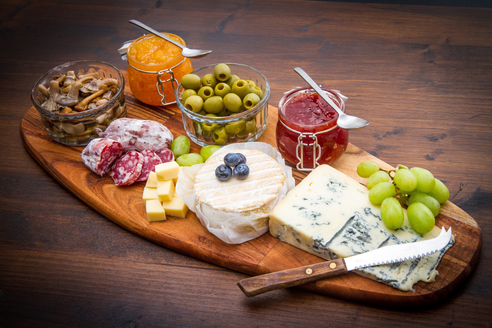Still Life Food Blueberries Cheese Grapes Olives Mushroom Cutting Board Jam Wooden Surface 1920x1280