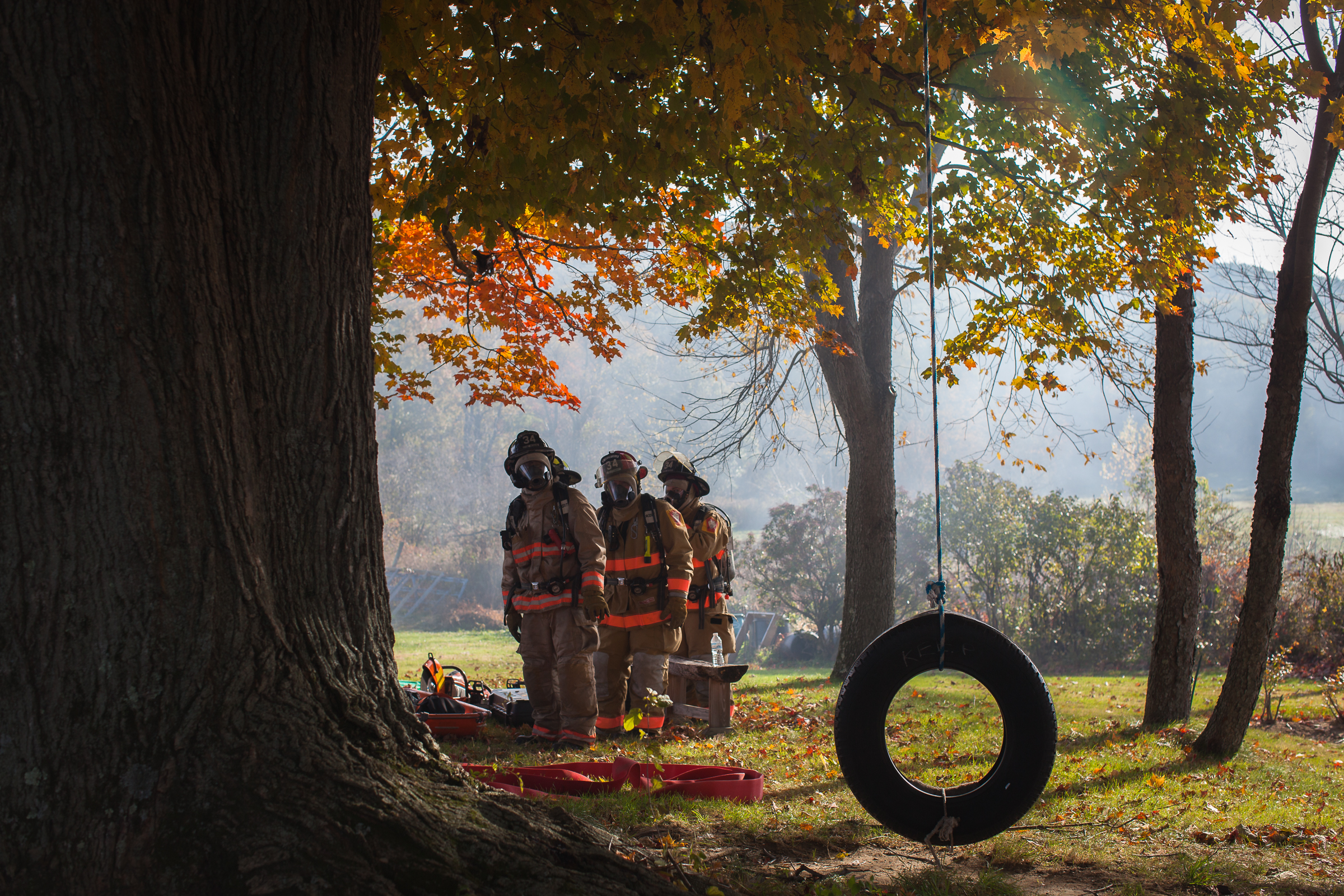 Men Outdoors Group Of People Trees Firefighers Fireman Gas Masks Tire Fall Leaves Nature 2400x1600