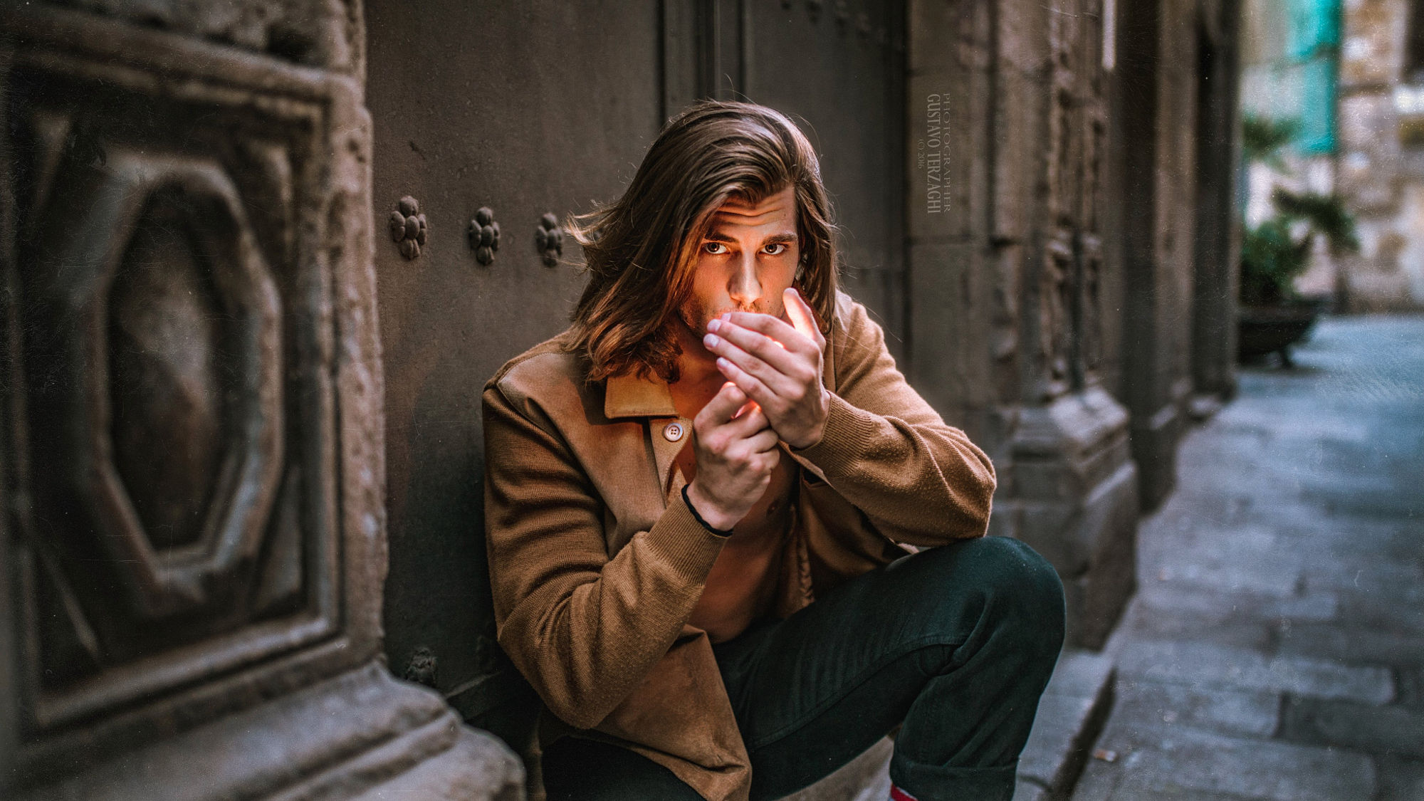 Men Male Models Brunette Long Hair Looking At Viewer Coats Jeans Brown City Smoking 2000x1125