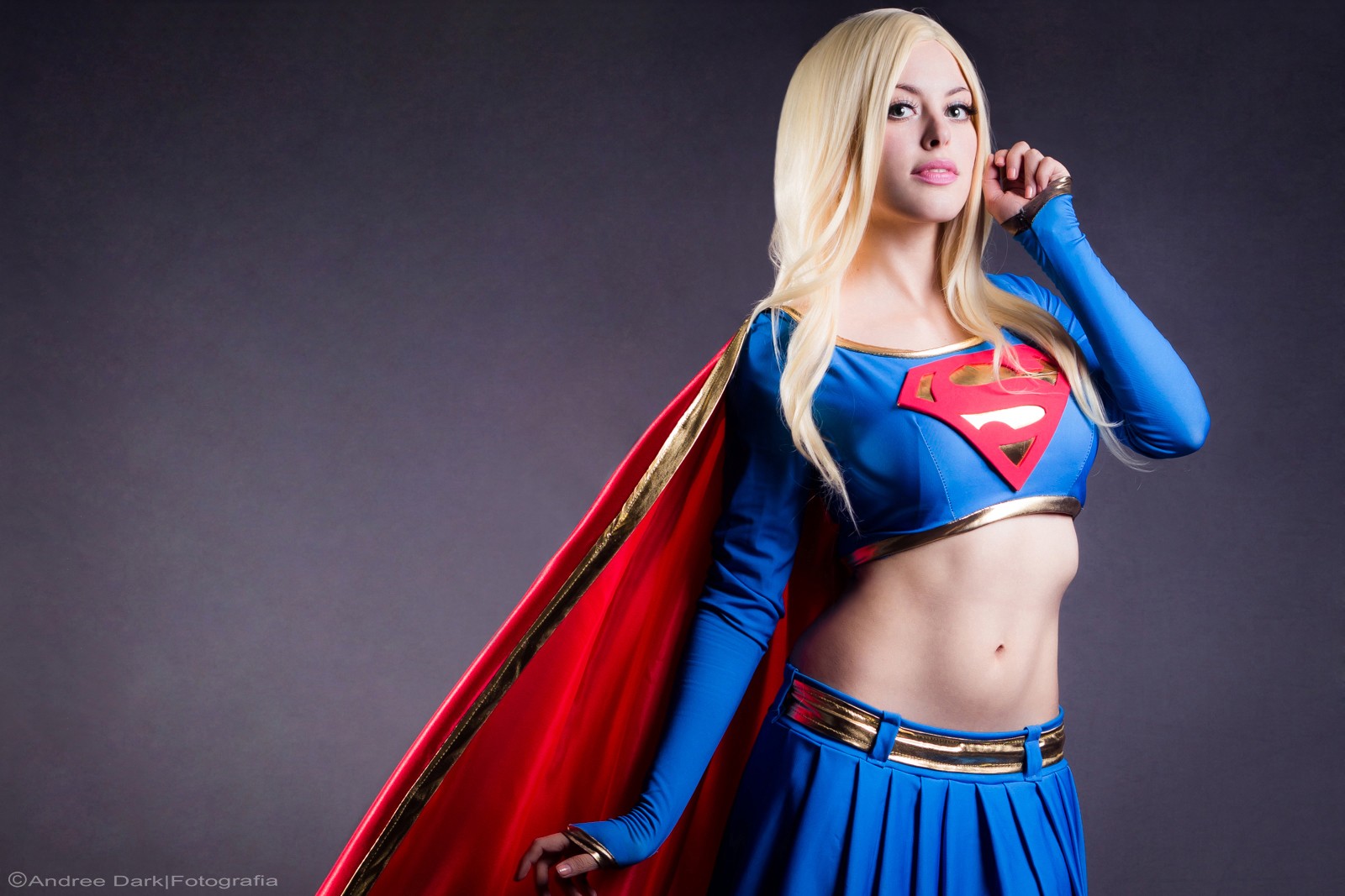 Women Model Long Hair Cosplay Simple Background Looking At Viewer Blonde Skirt Open Mouth Supergirl  1600x1067